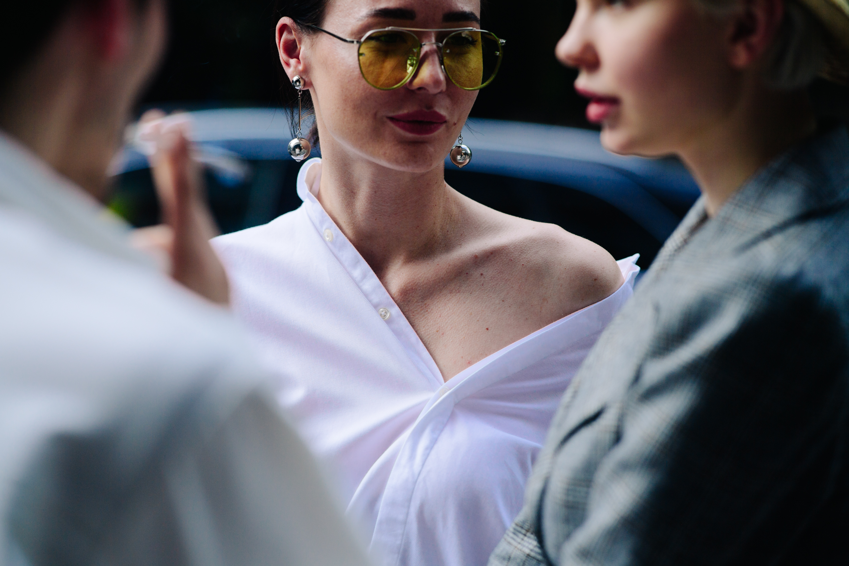 Girl wearing a pair of aviators