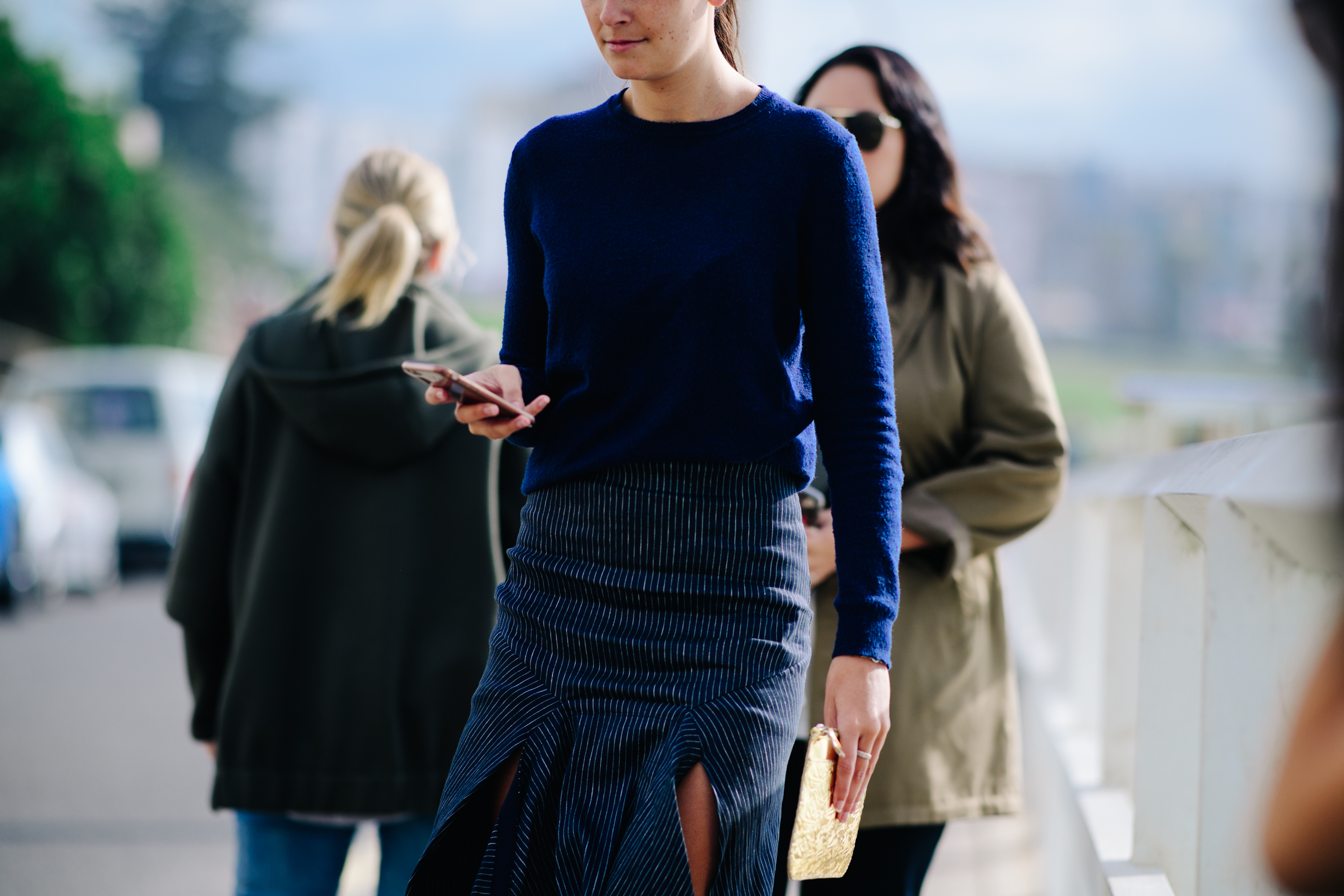 Girl wearing a wool blue sweater
