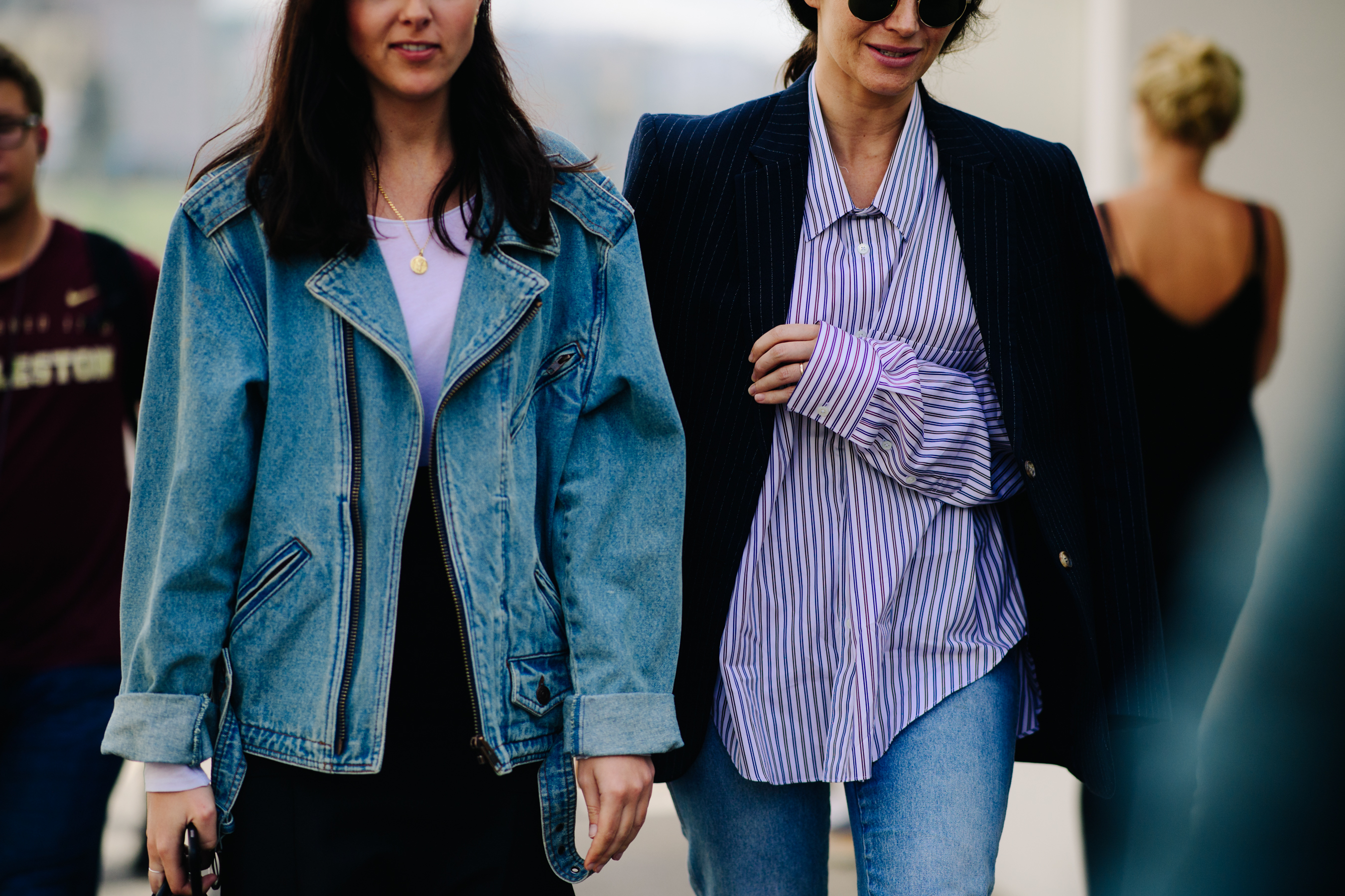 Woman wearing a denim perfecto