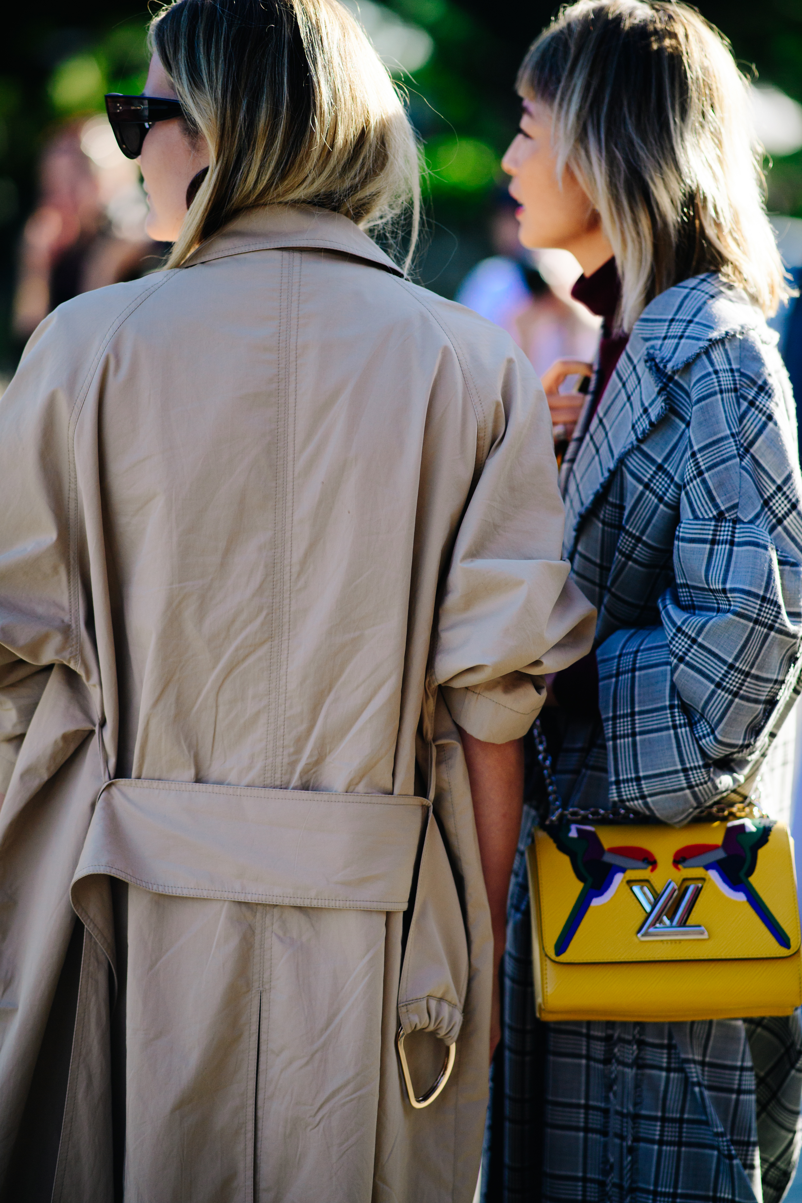 Two girls standing on the street