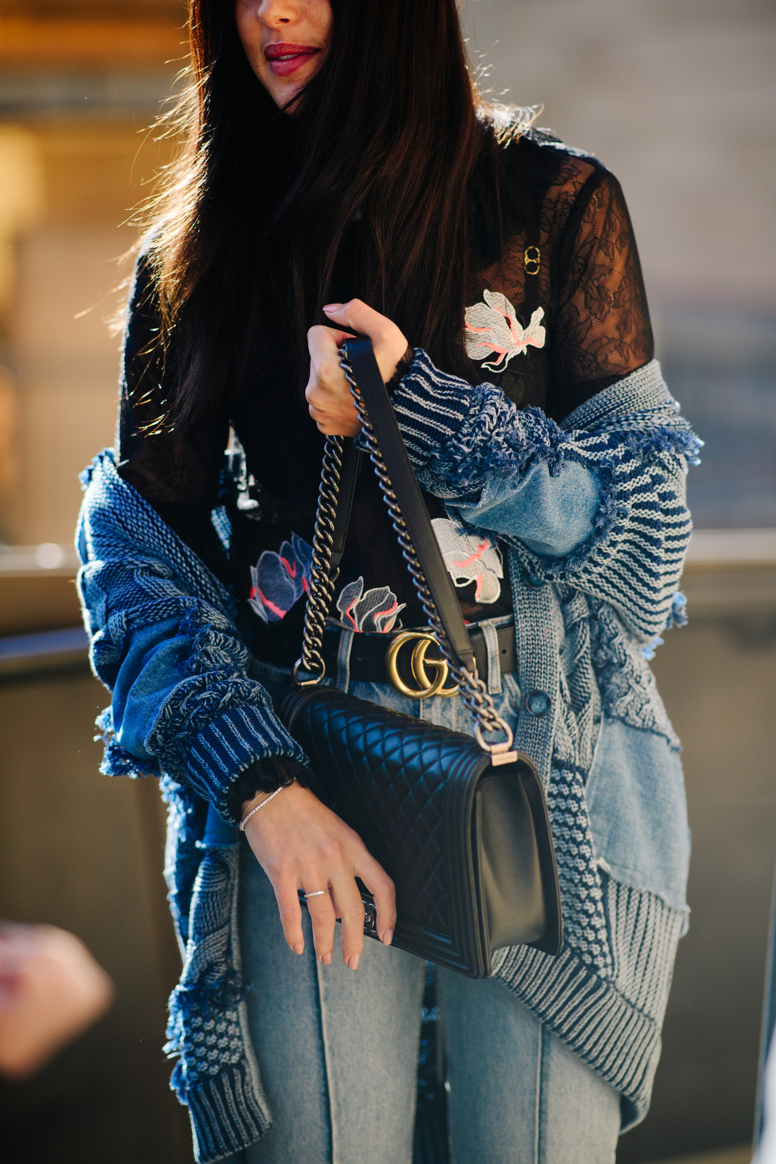 Girl wearing a black Gucci belt