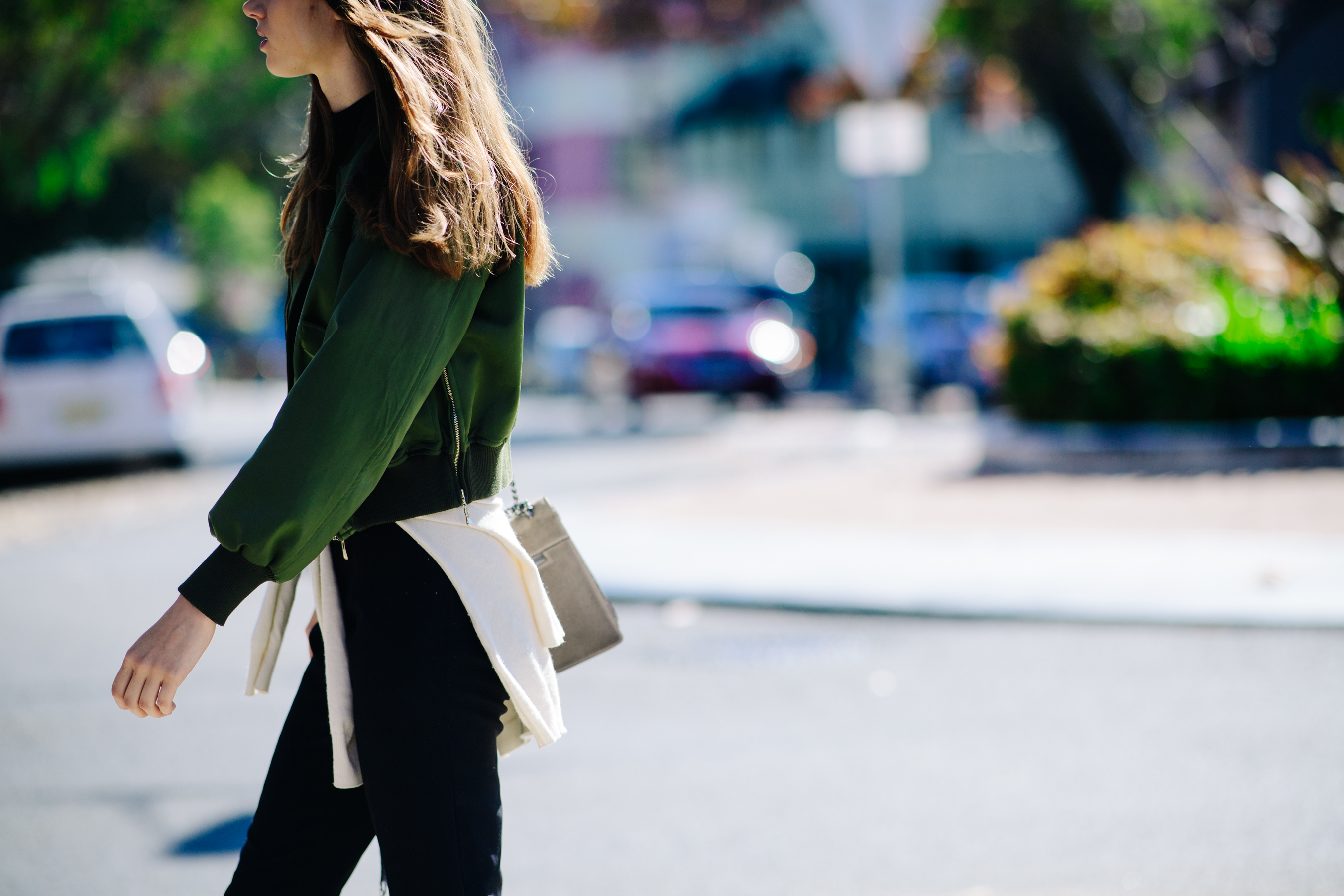 Girl wearing a green jumper