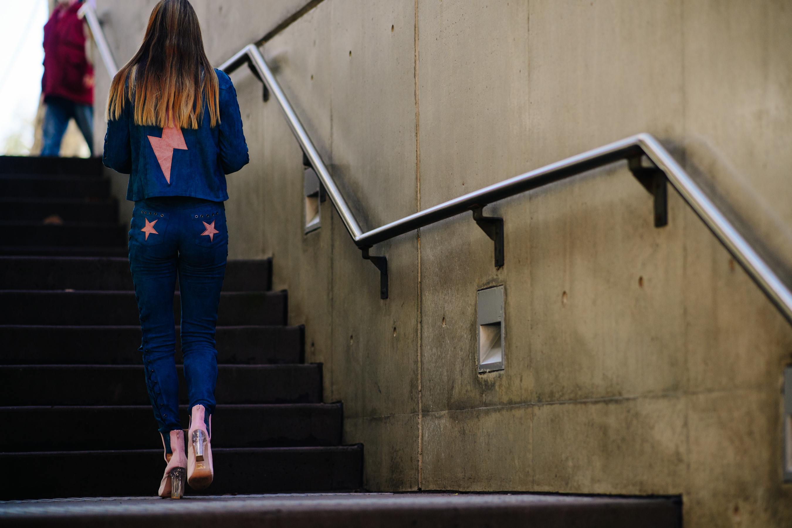Girl wearing embroidered jeans and jacket