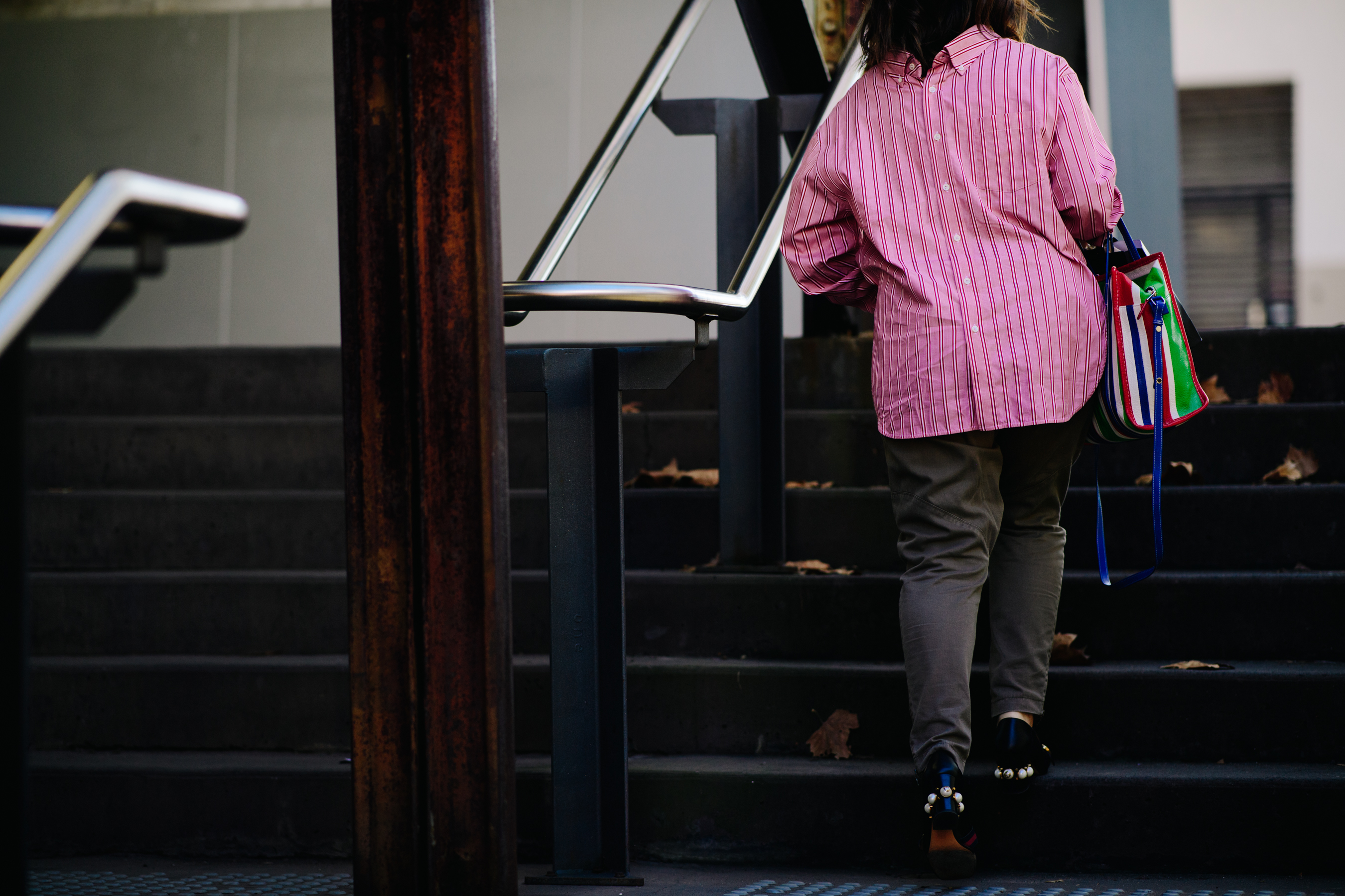 Woman wearing Gucci pearl shoes