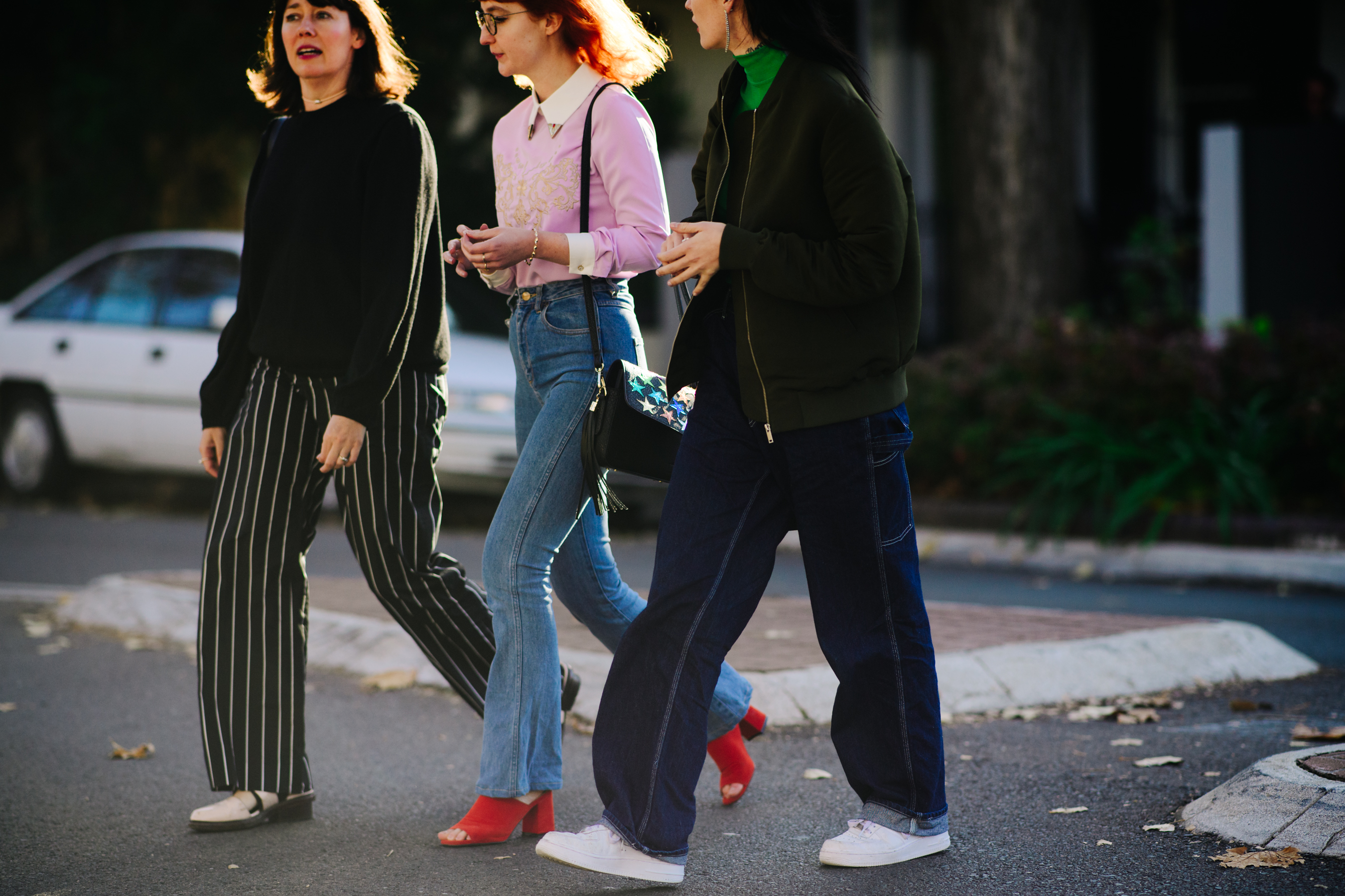 Three women chatting on the street