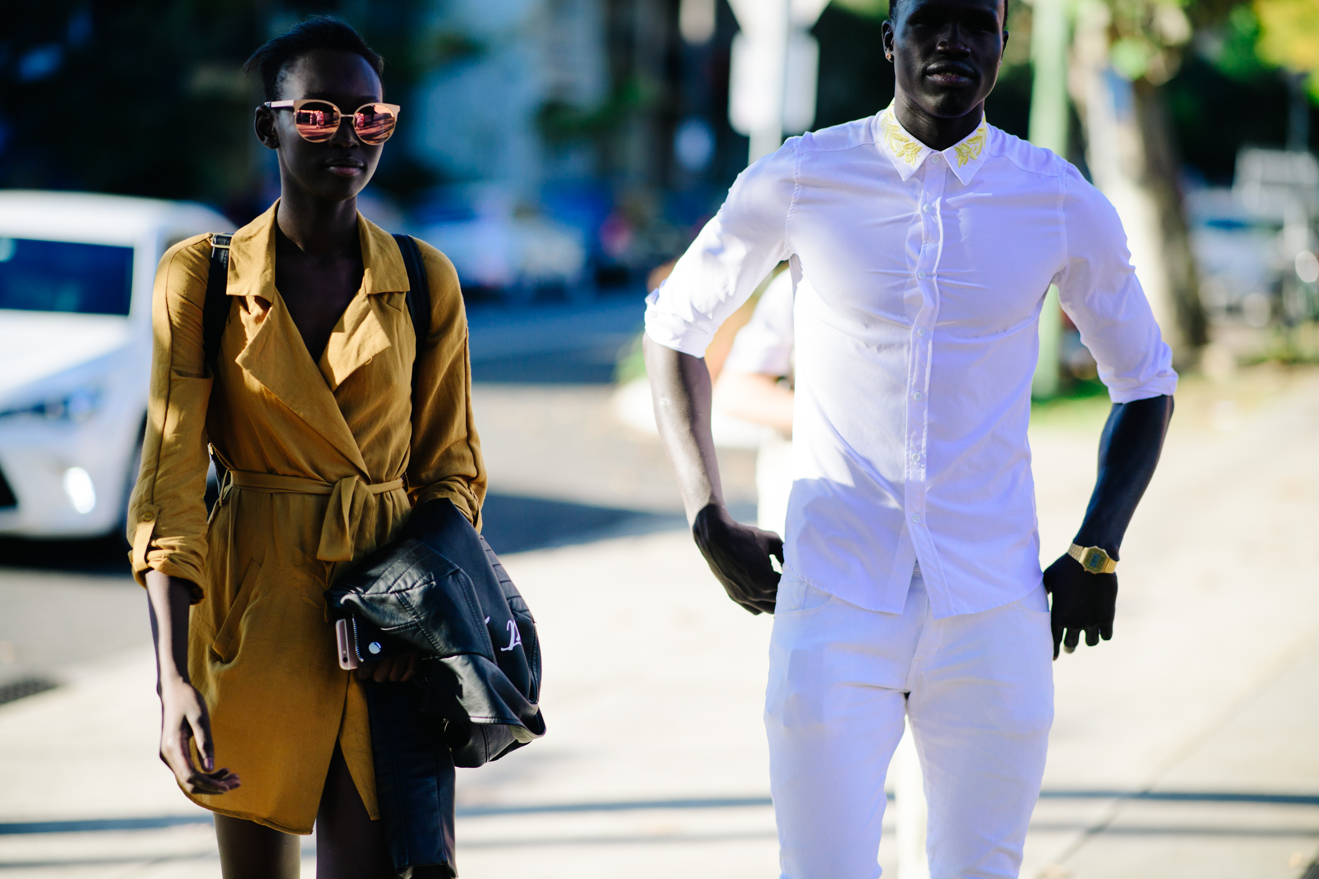 African couple walking down the street