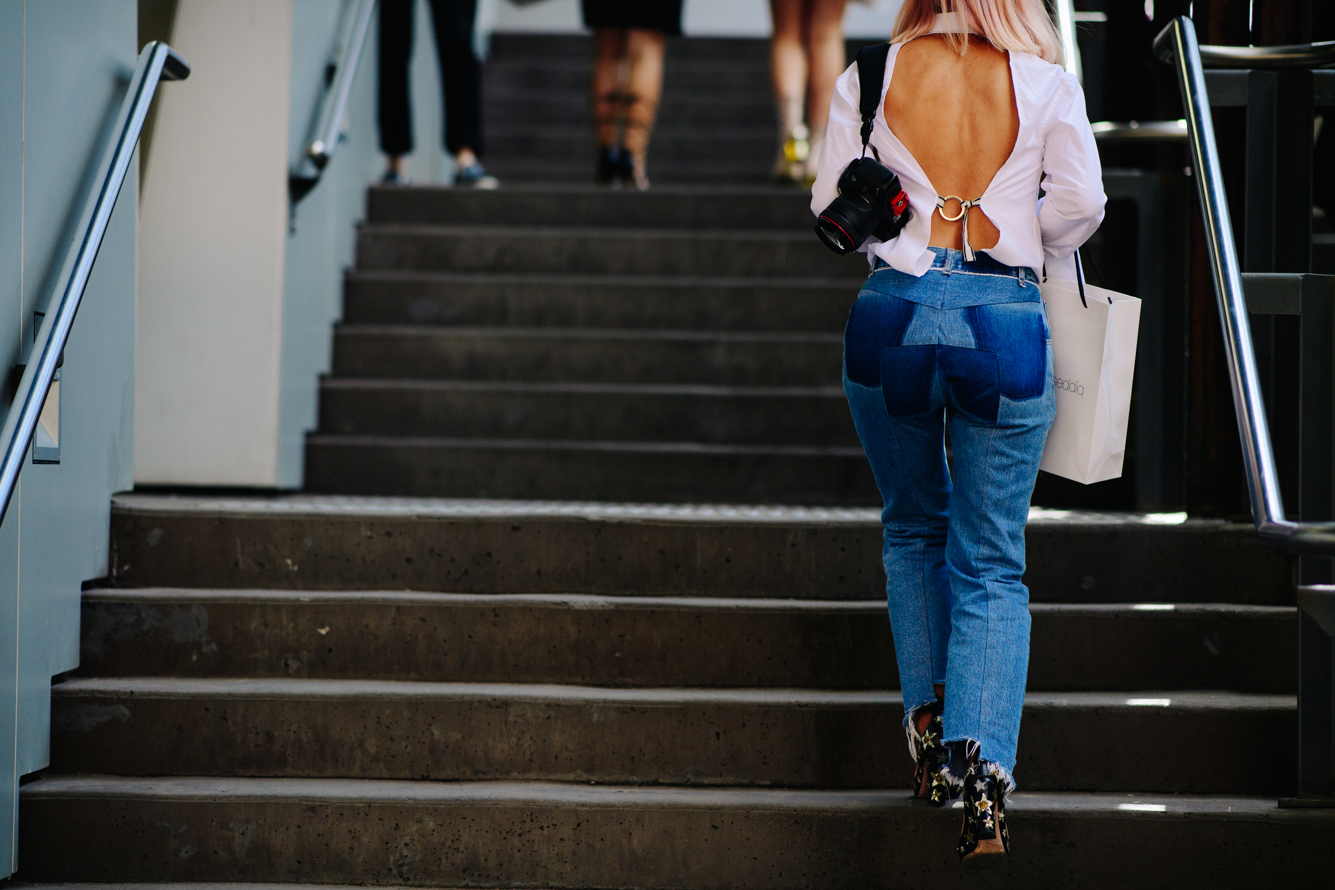 Woman wearing Vetements blue jeans