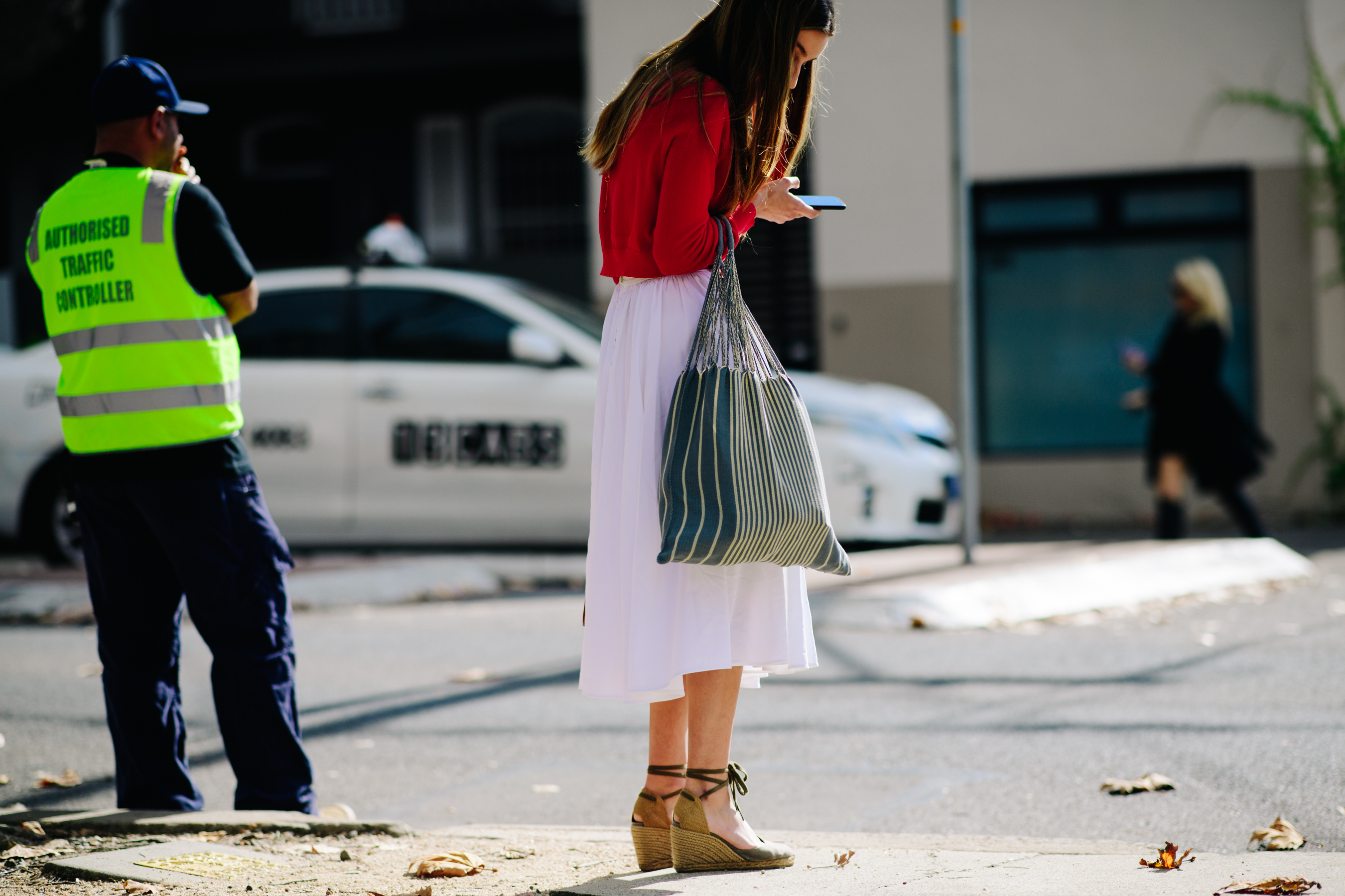 Girl wearing a red cardigan