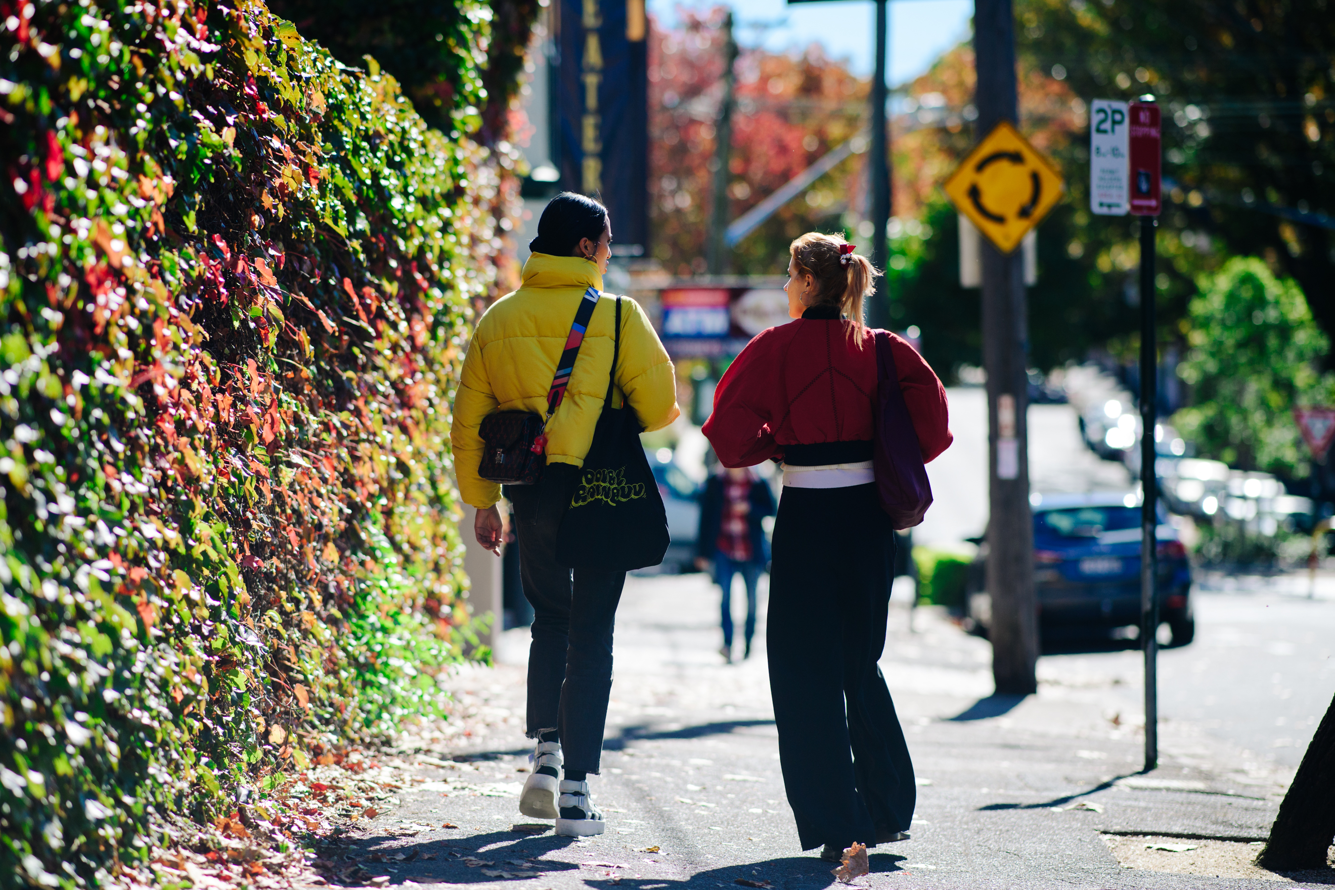 Two girls wearing winter jackets