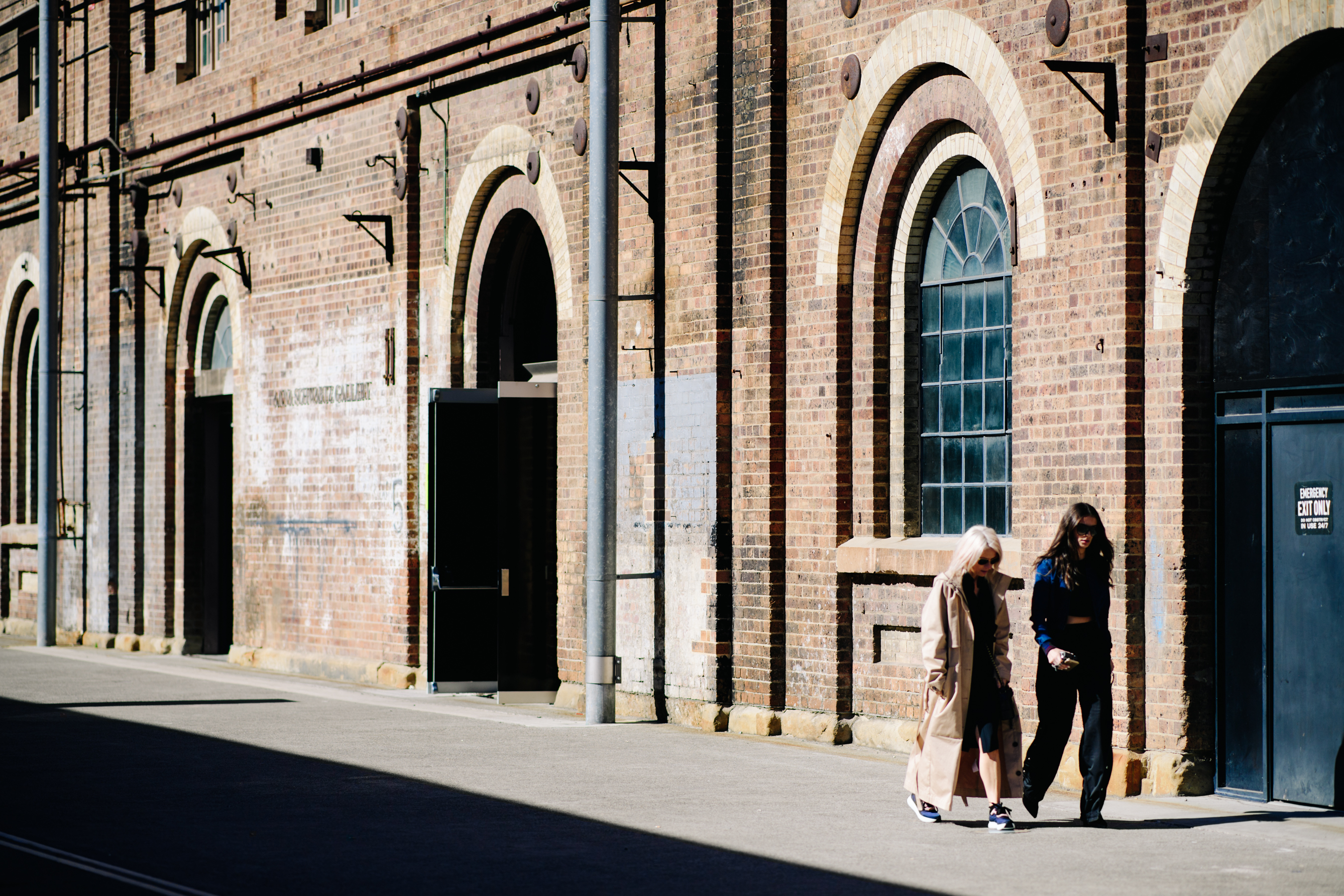 Two girls walking on the street