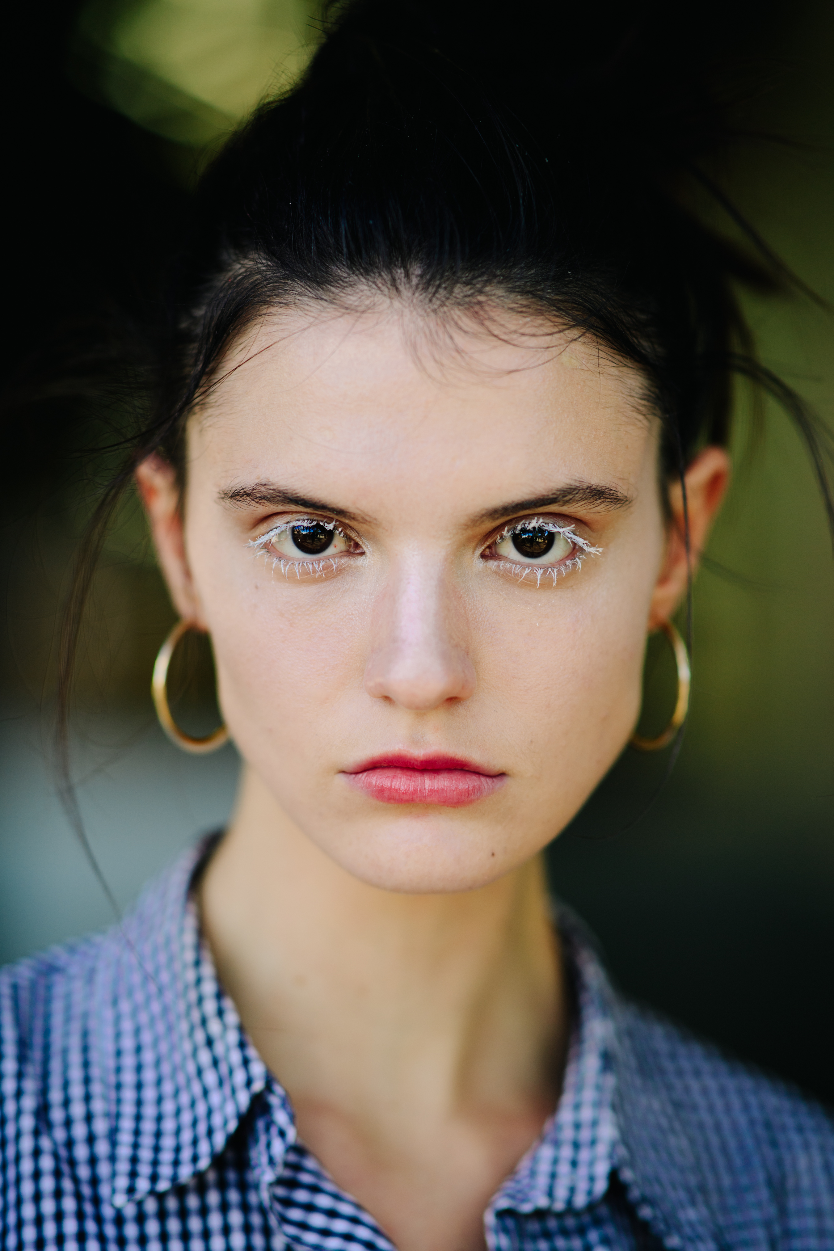 Portrait of a model with white lashes