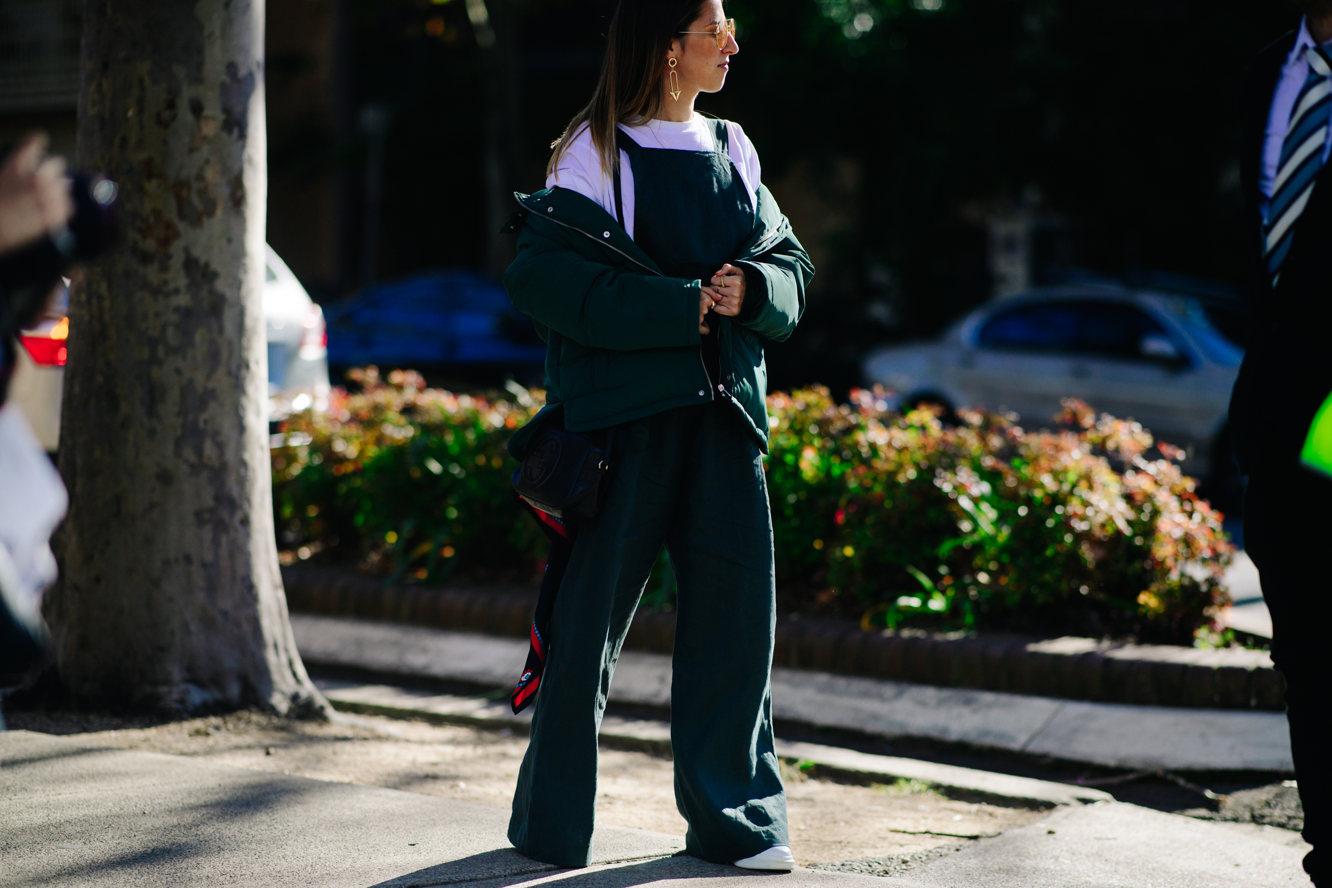 Girl wearing a green overall