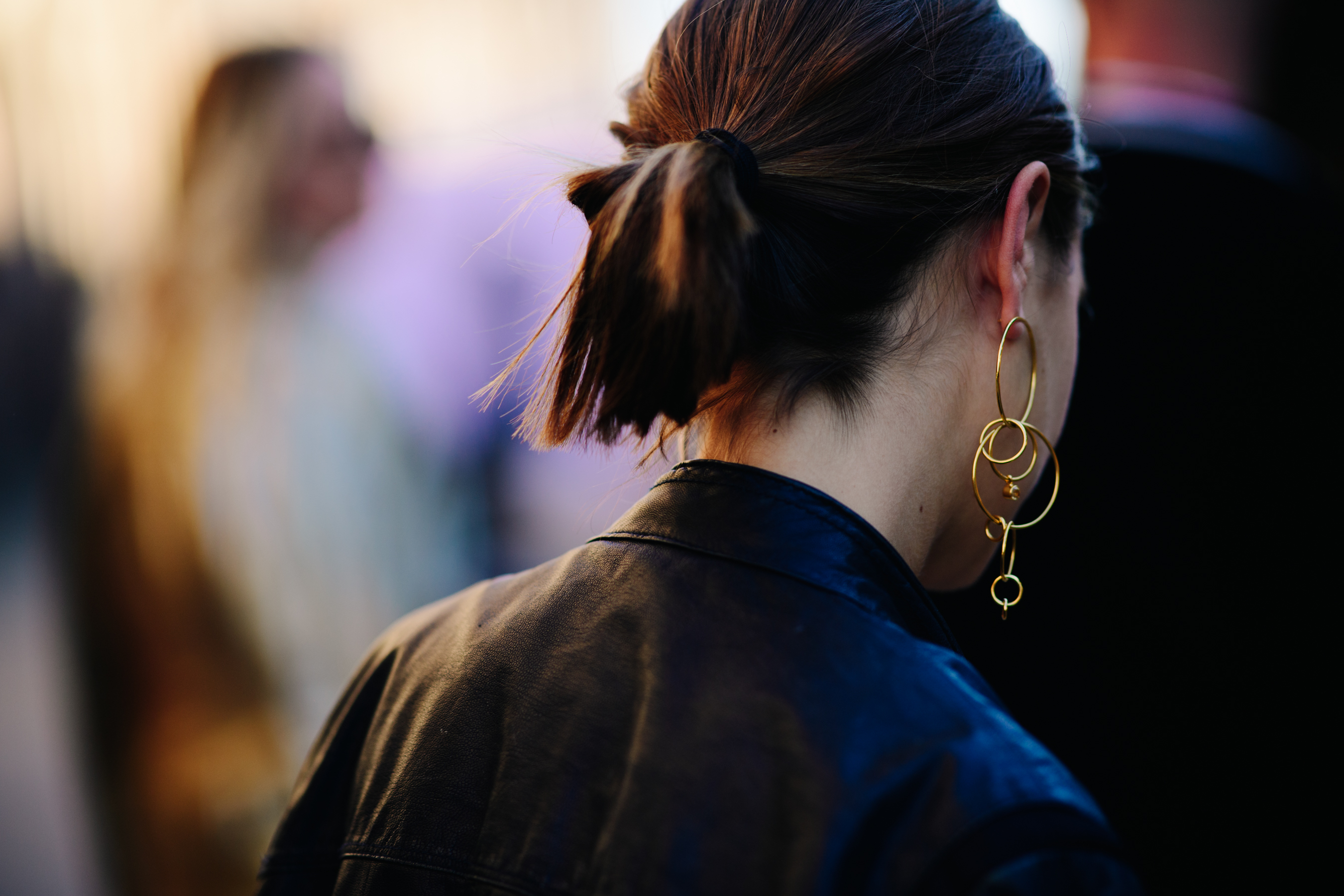 Girl wearing a big golden earring