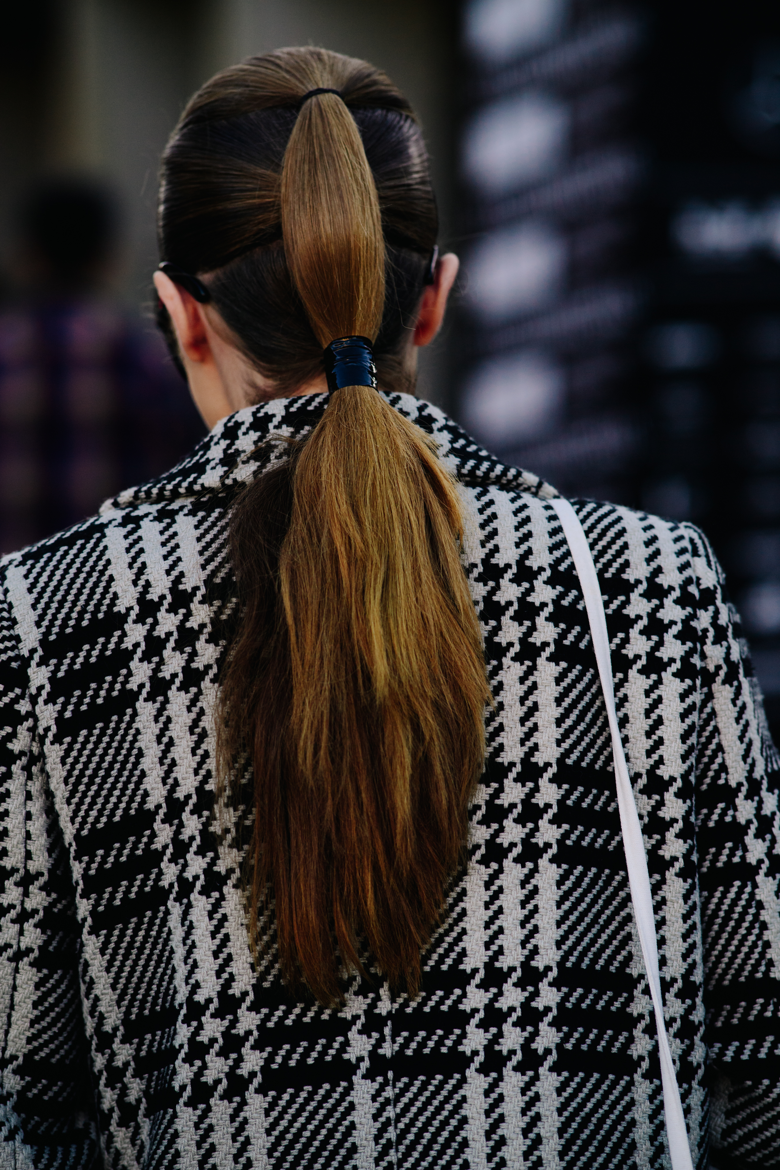 Girl wearing a houndstooth jacket
