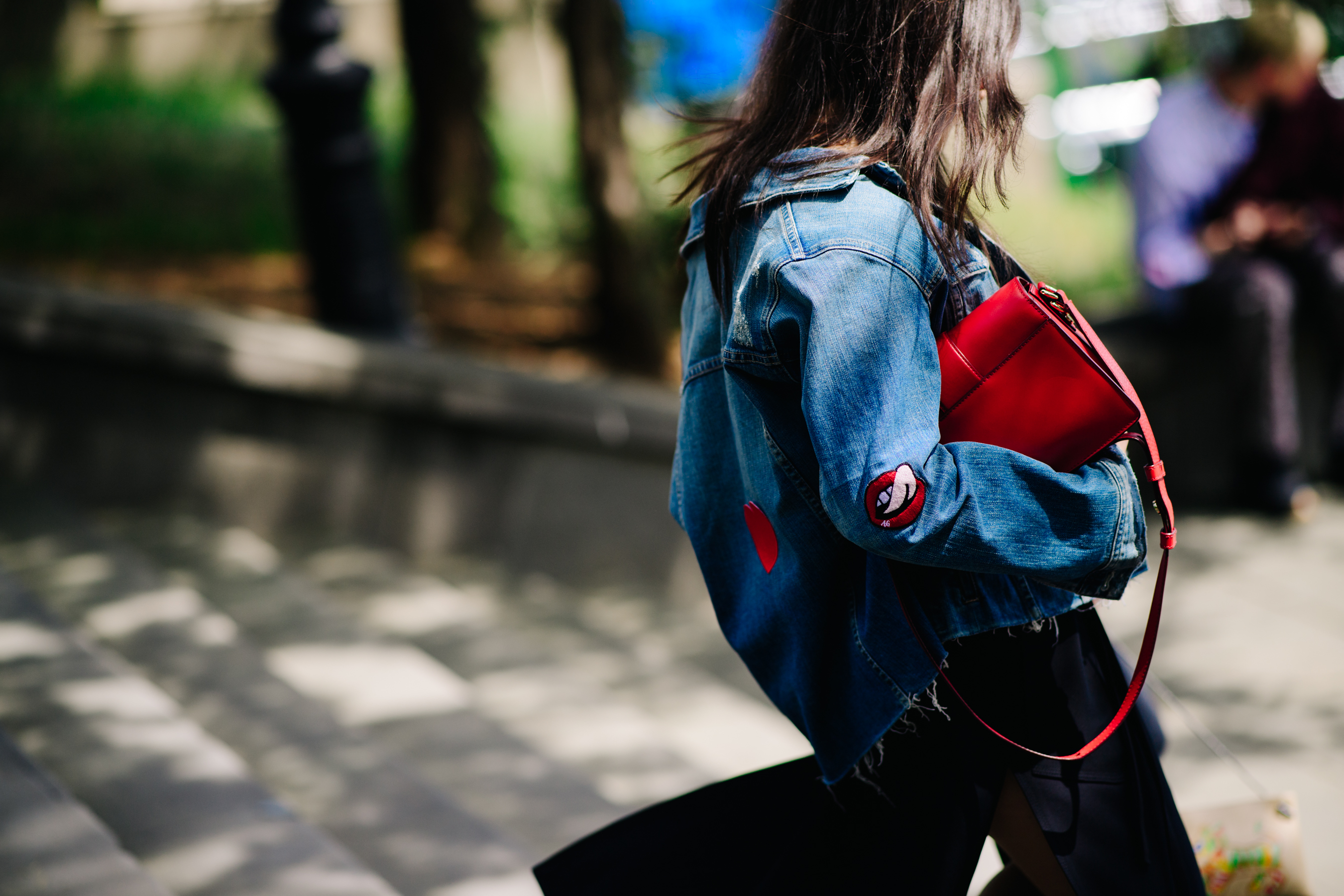 Girl wearing a customised denim jacket