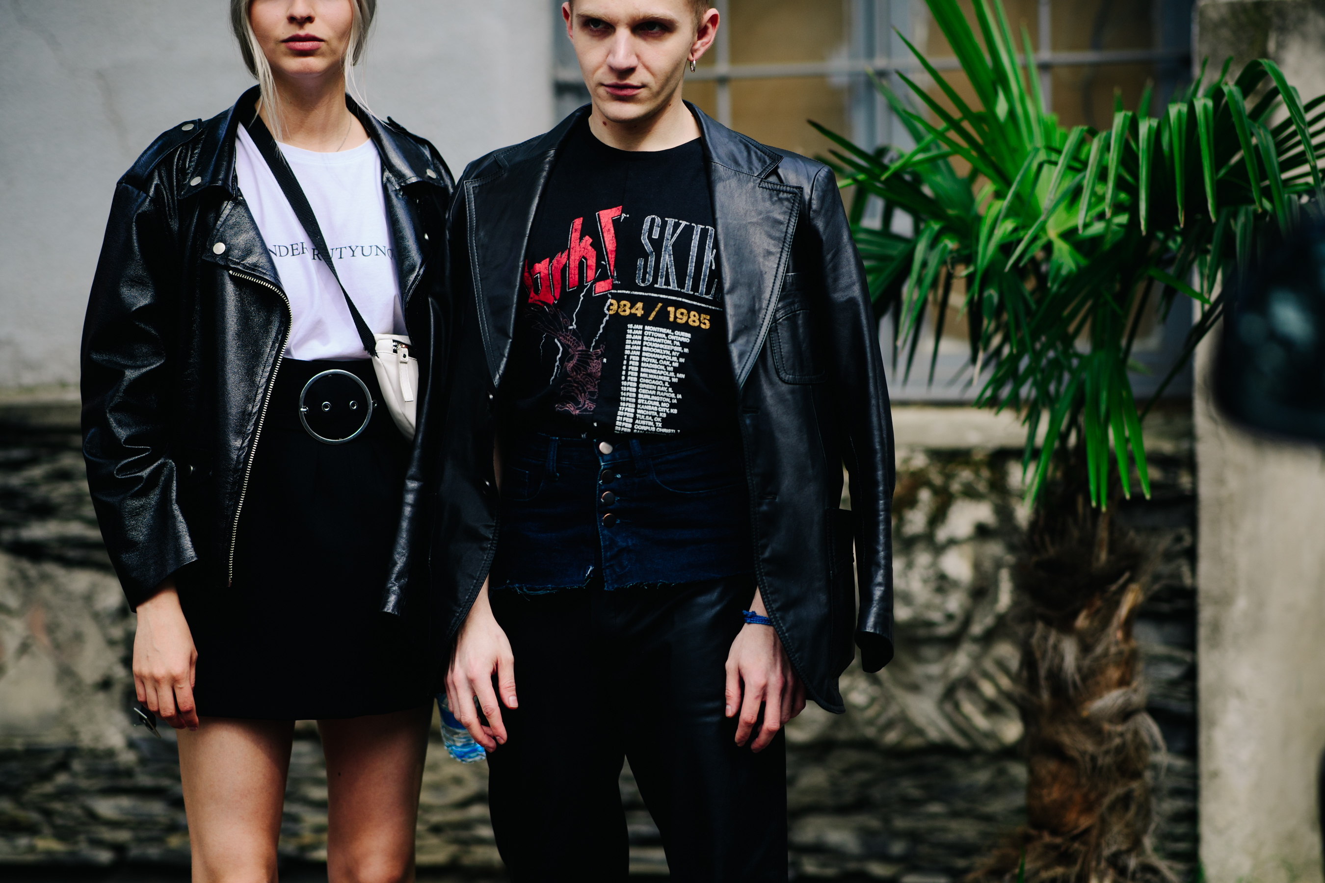 Girl and boy wearing leather jackets