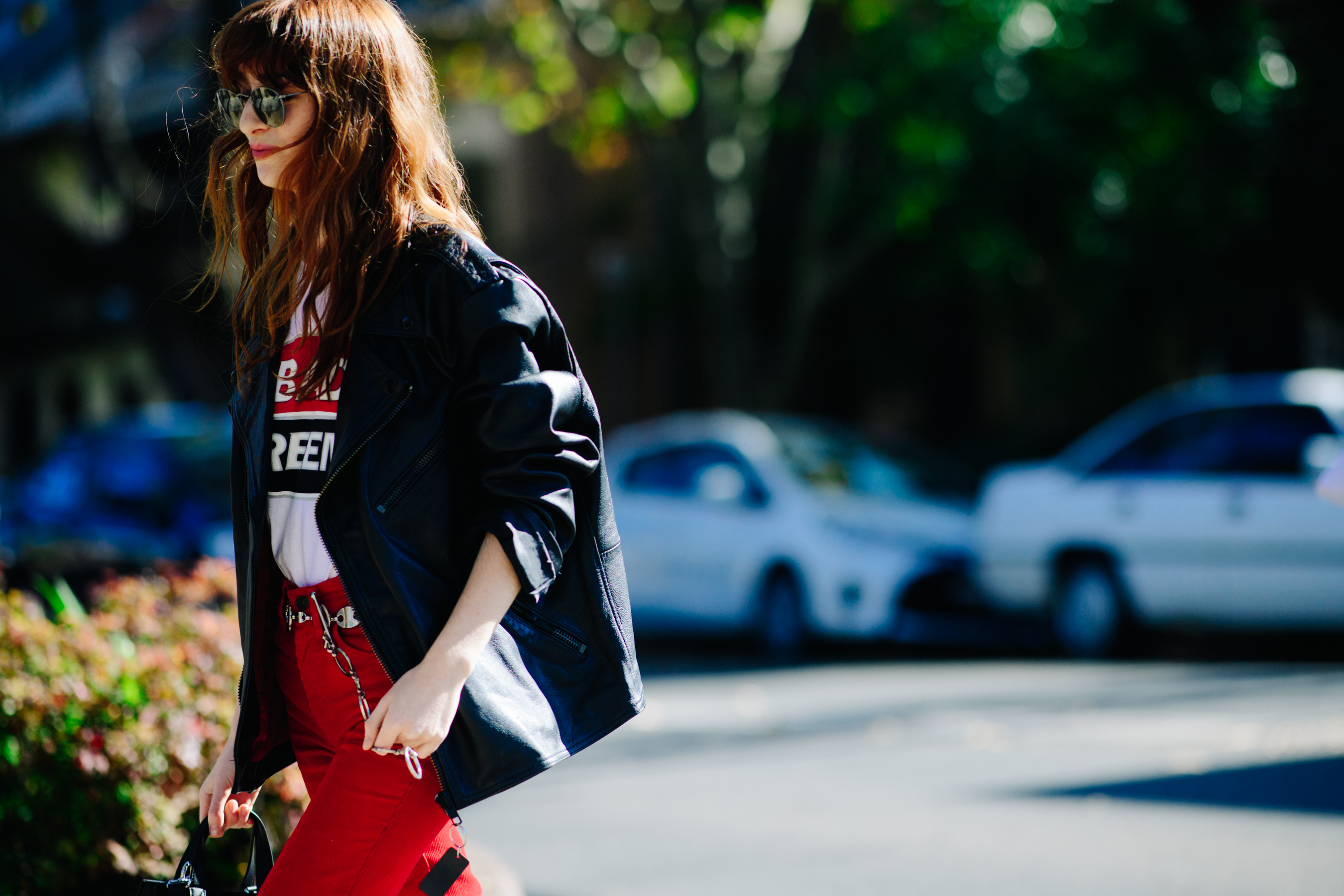 Woman wearing red skinny jeans