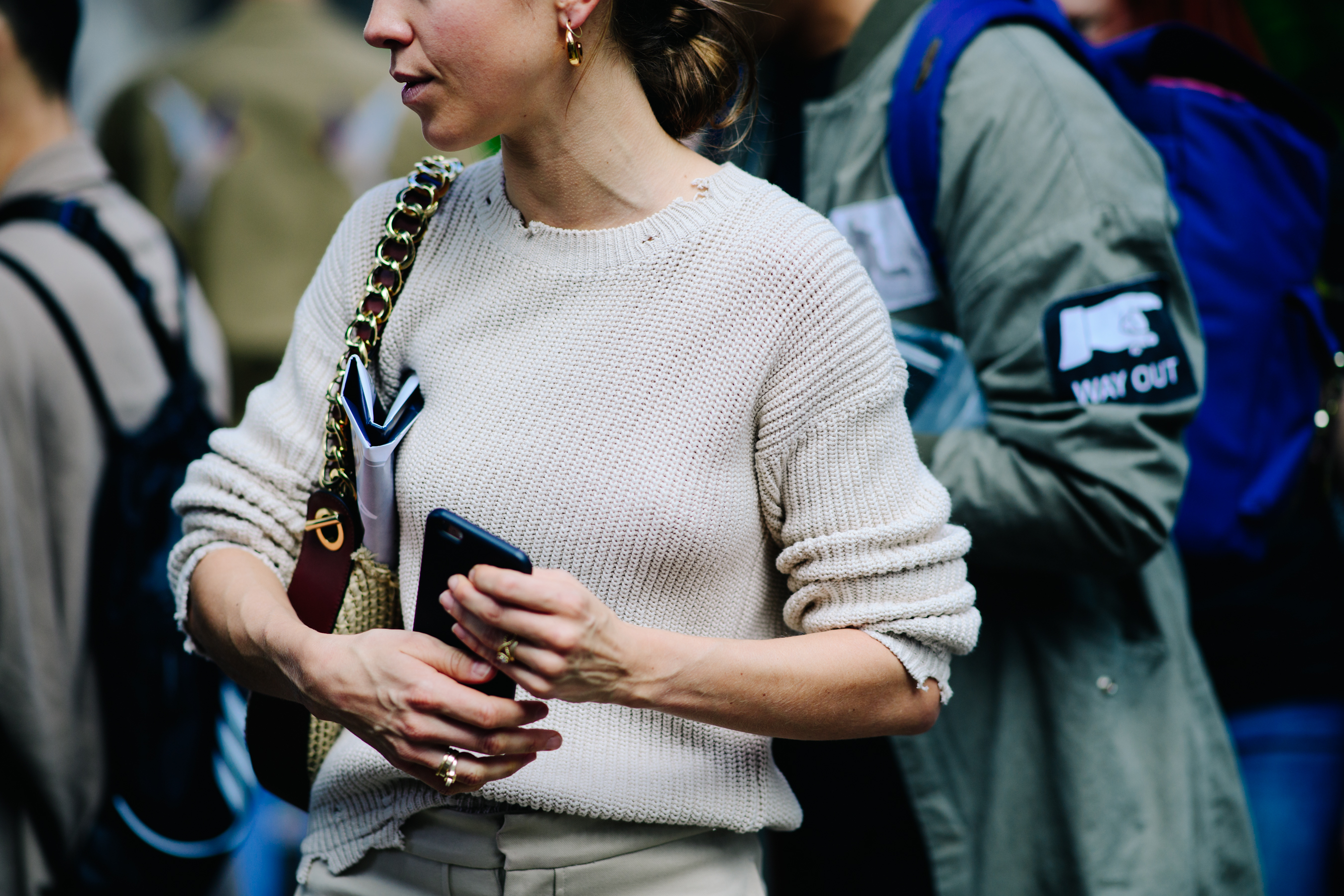Girl wearing a beige knitted sweater