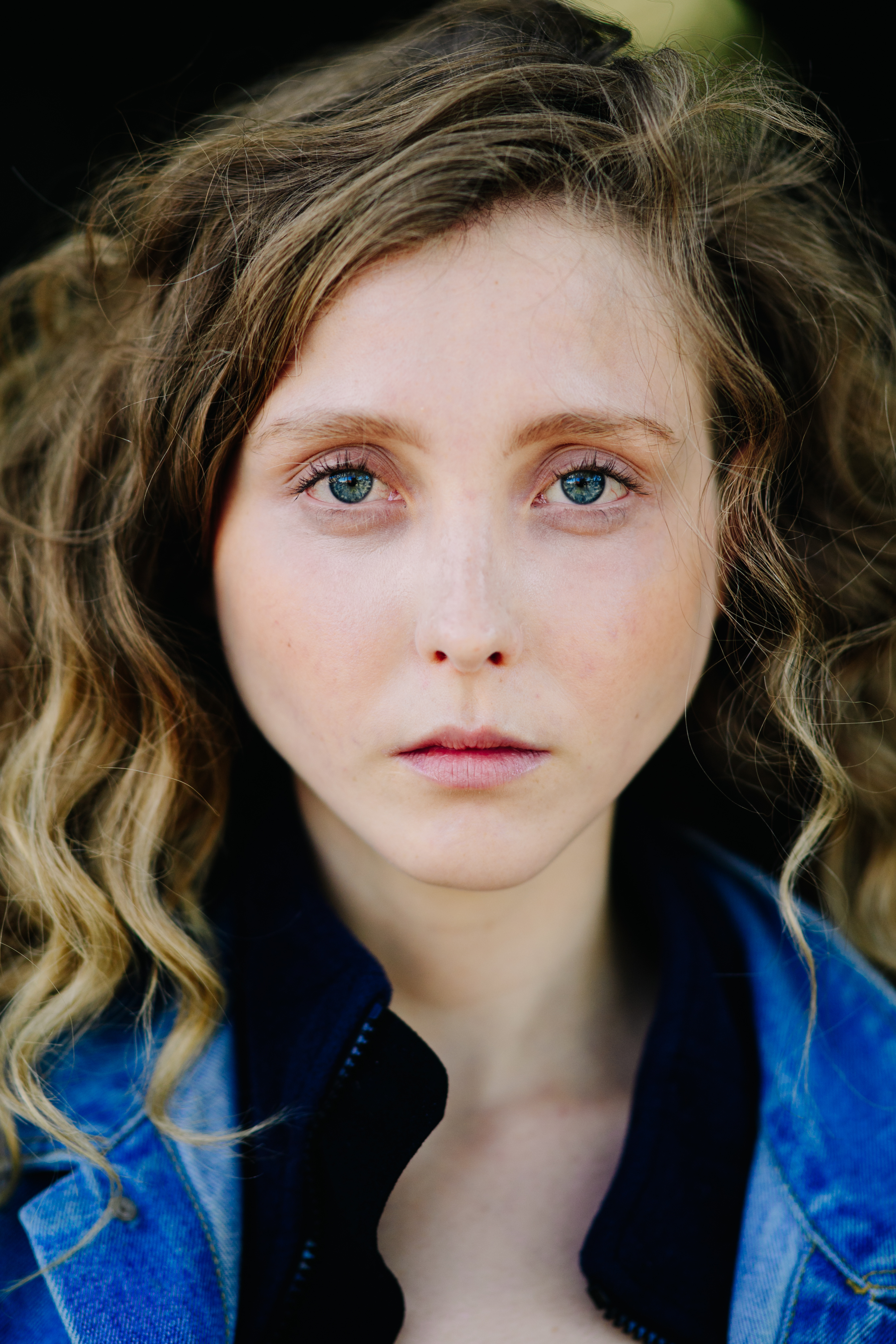 Girl wearing a denim jacket