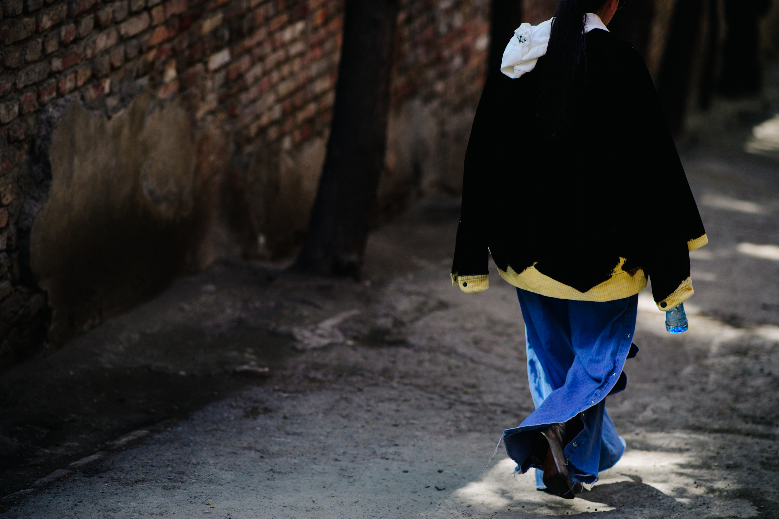 Italian stylist wearing deconstructed jeans