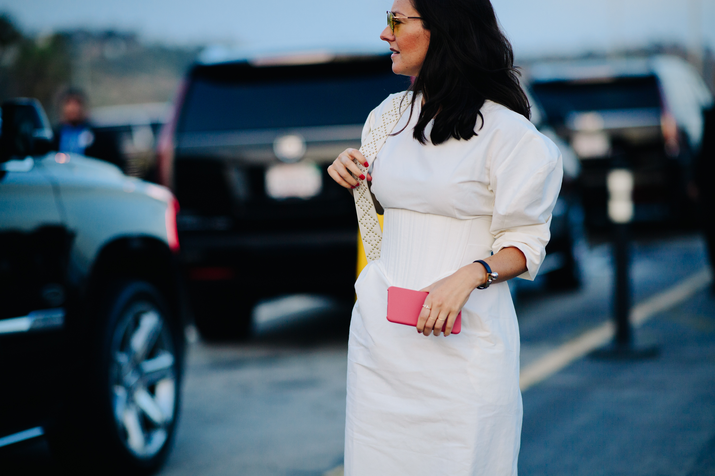Woman wearing a white corset dress
