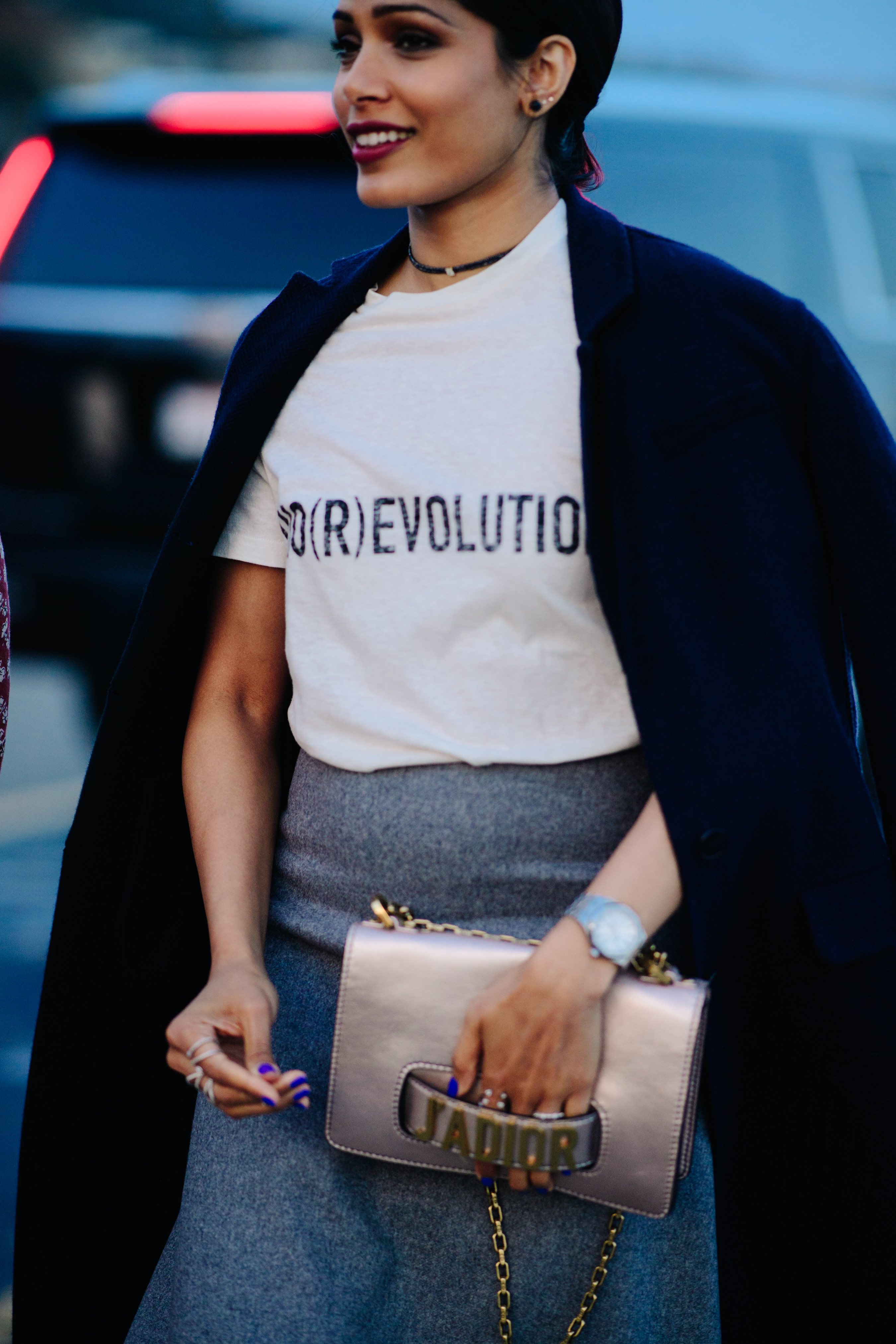 Woman wearing a navy blue coat