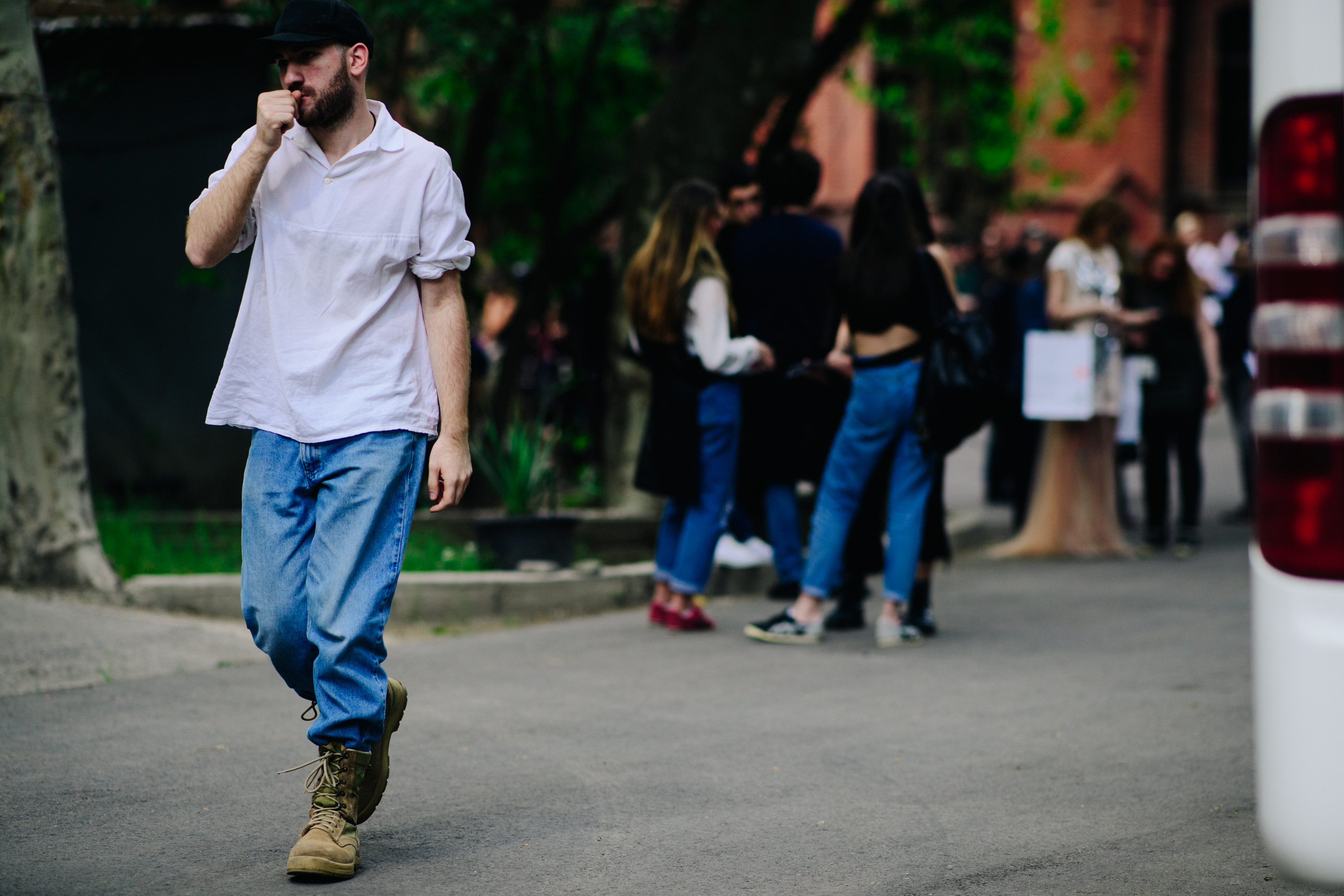 Man wearing a black baseball cap