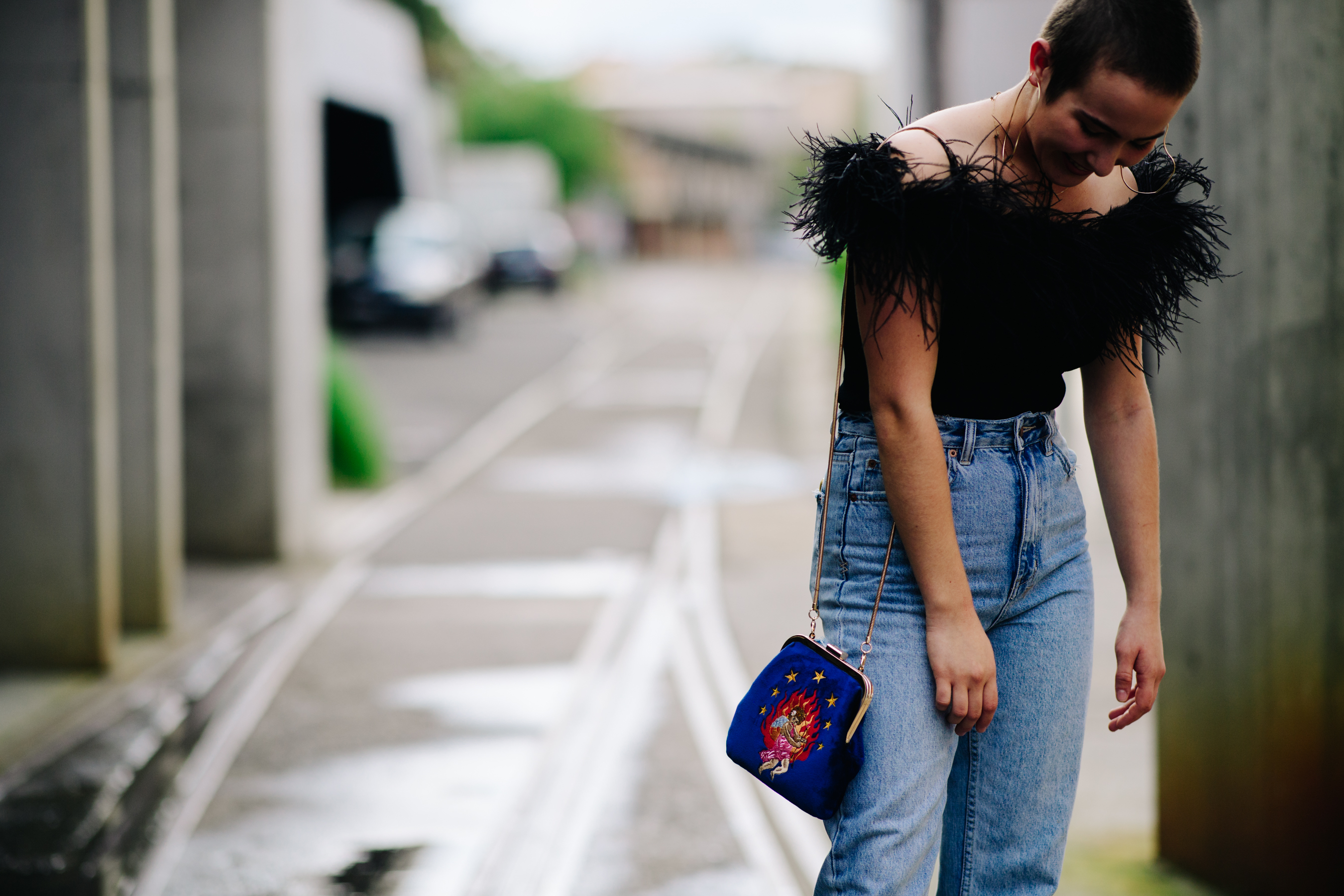 Girl wearing a feathered top