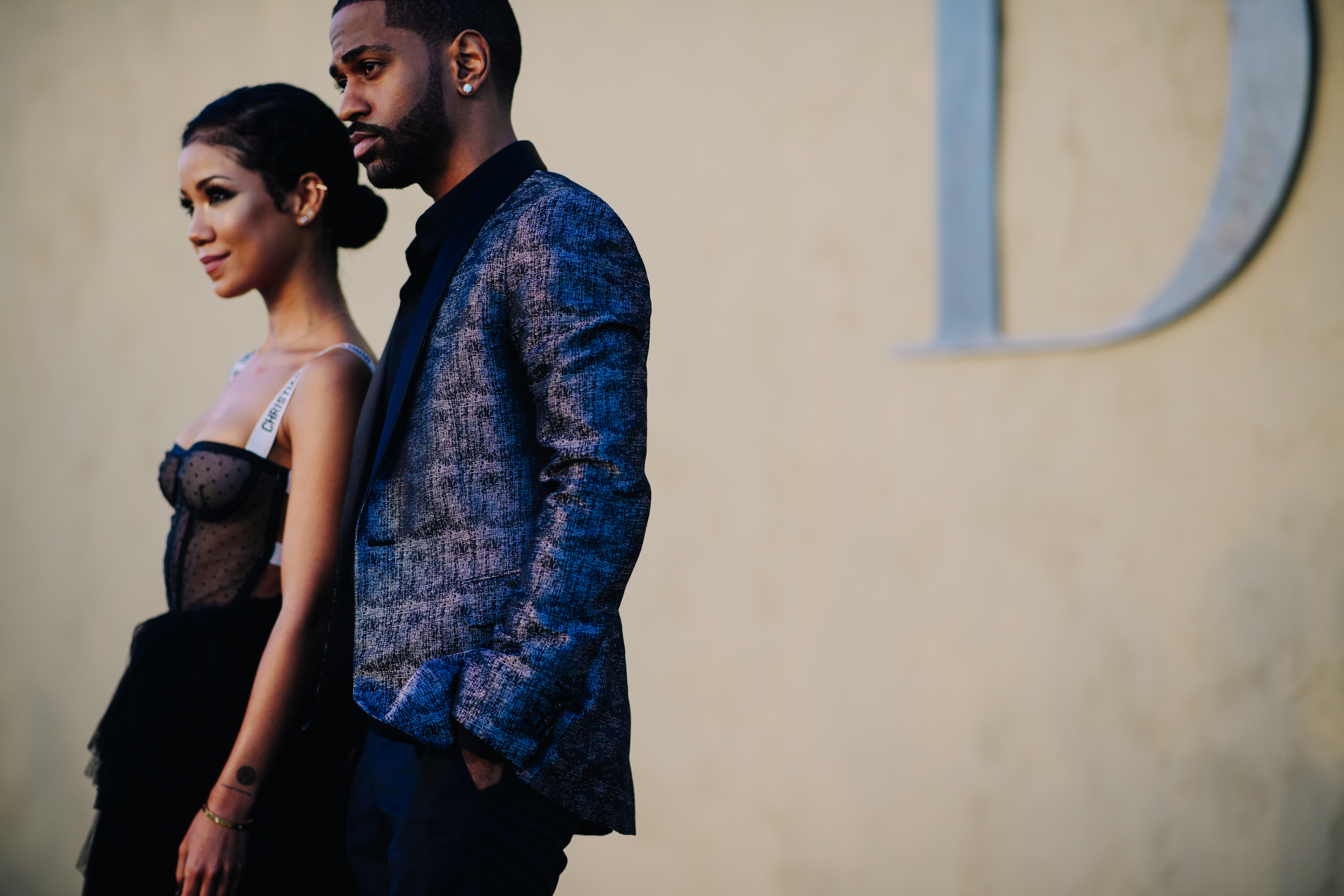 Music couple wearing Dior outfits