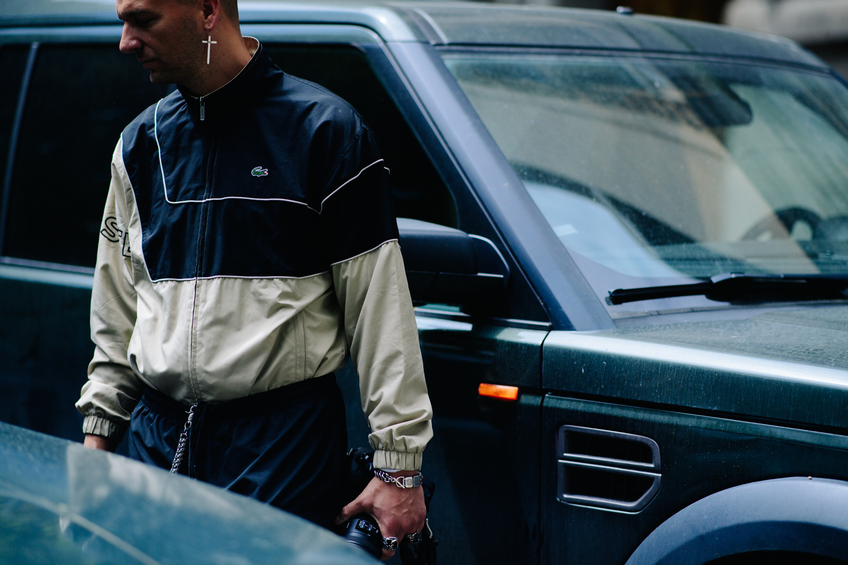French photographer wearing a tracksuit