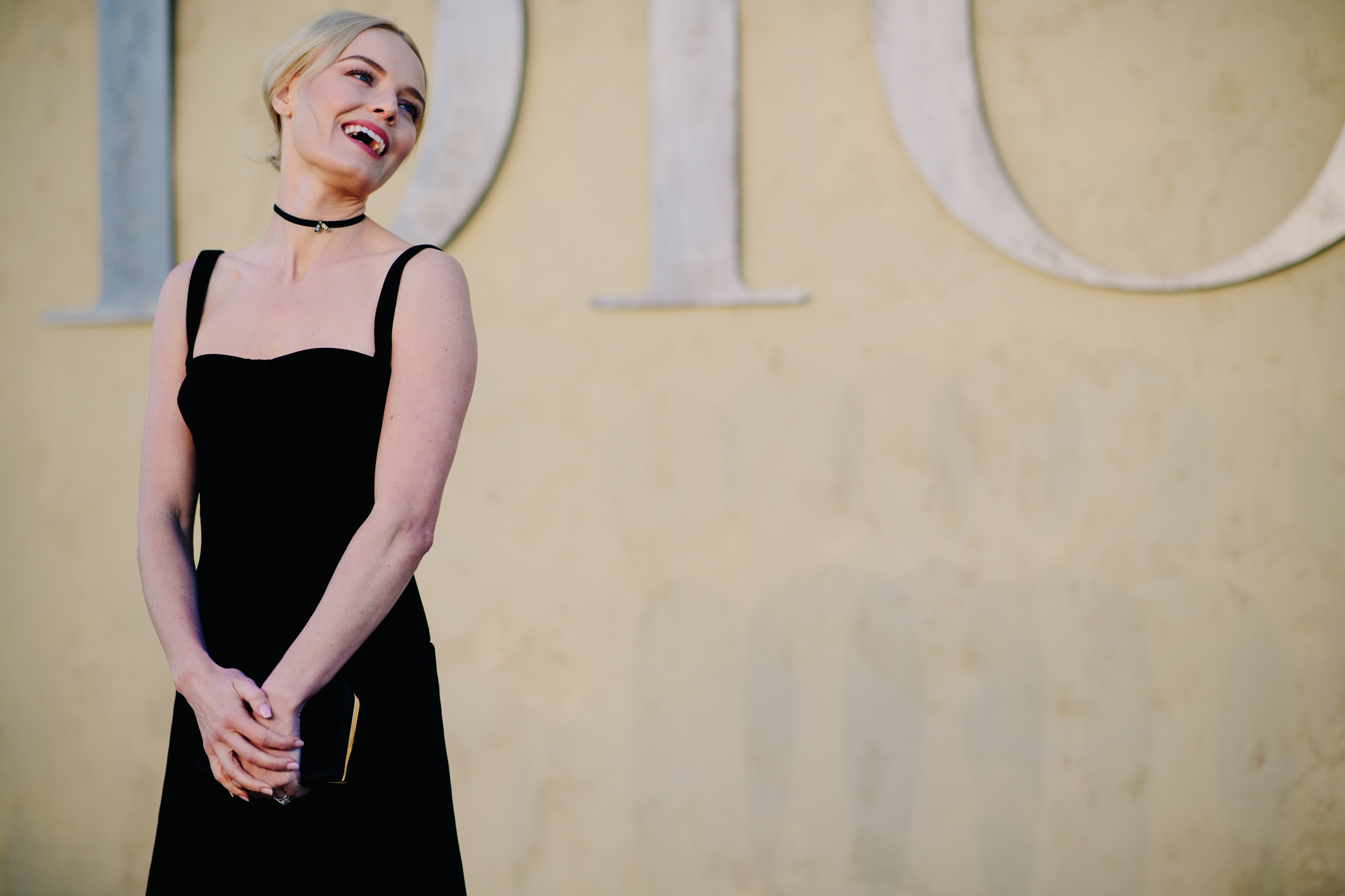 Girl wearing a minimalistic black dress