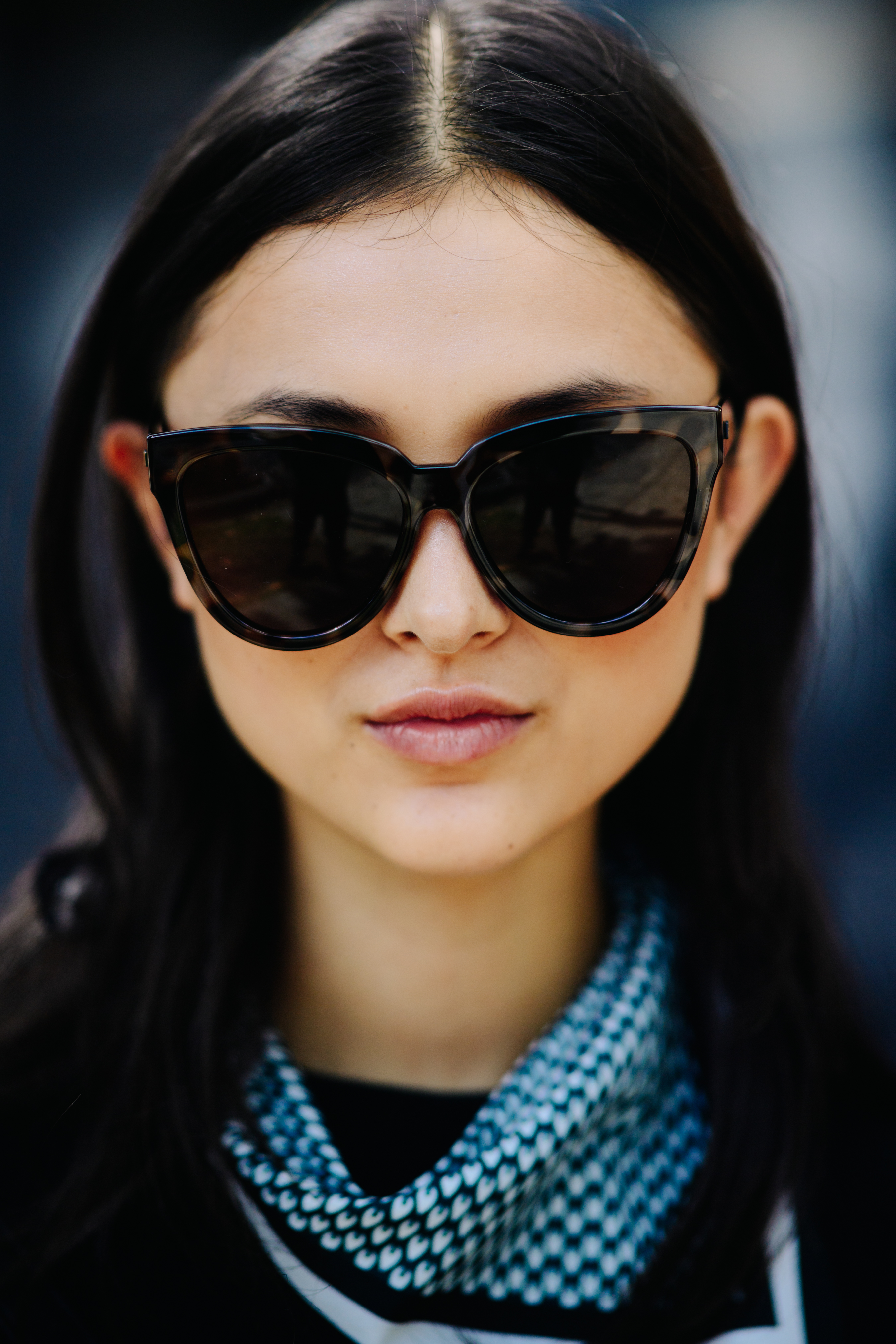 Australian model wearing tortoise shades
