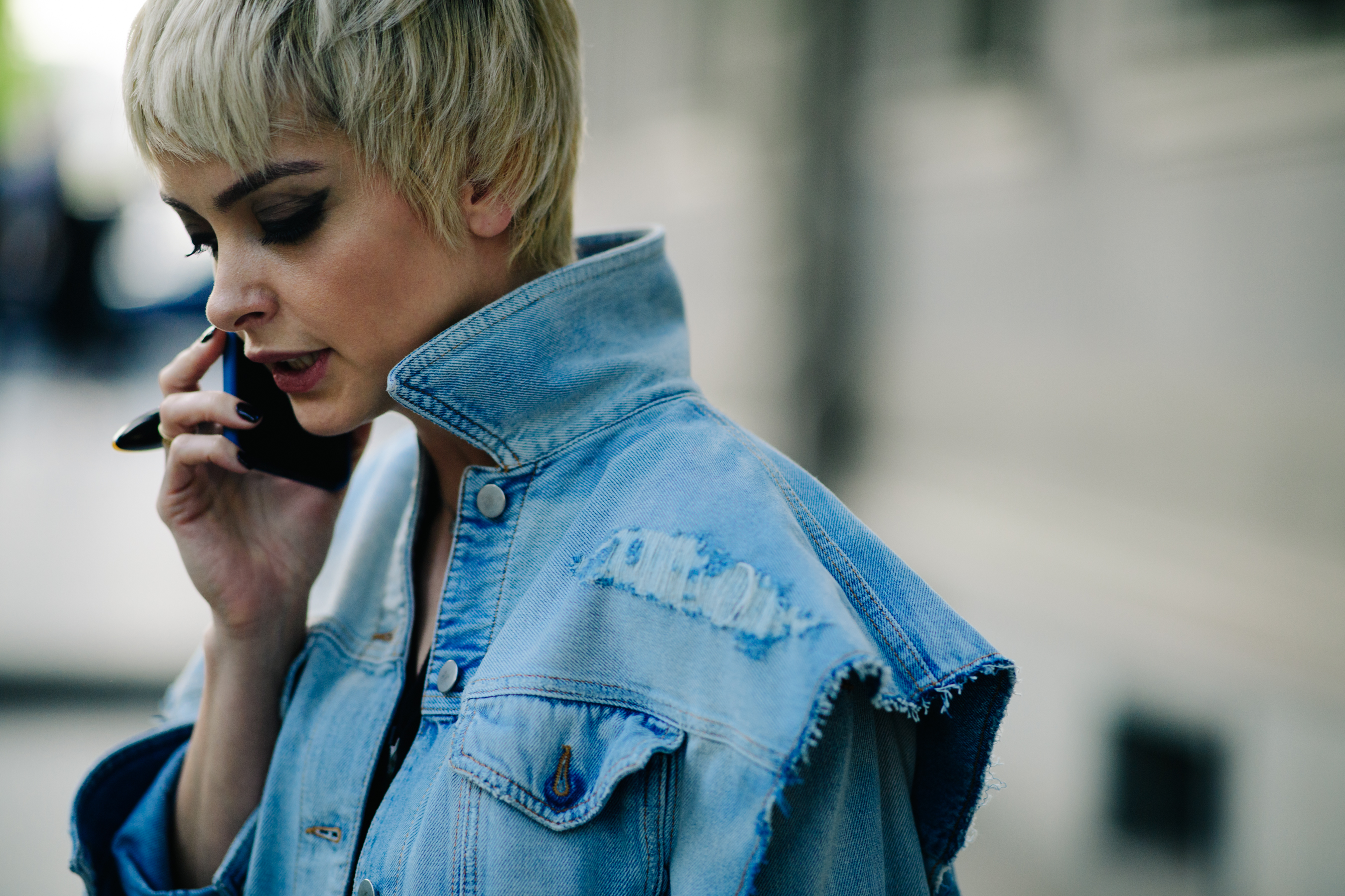 Designer wearing denim jacket