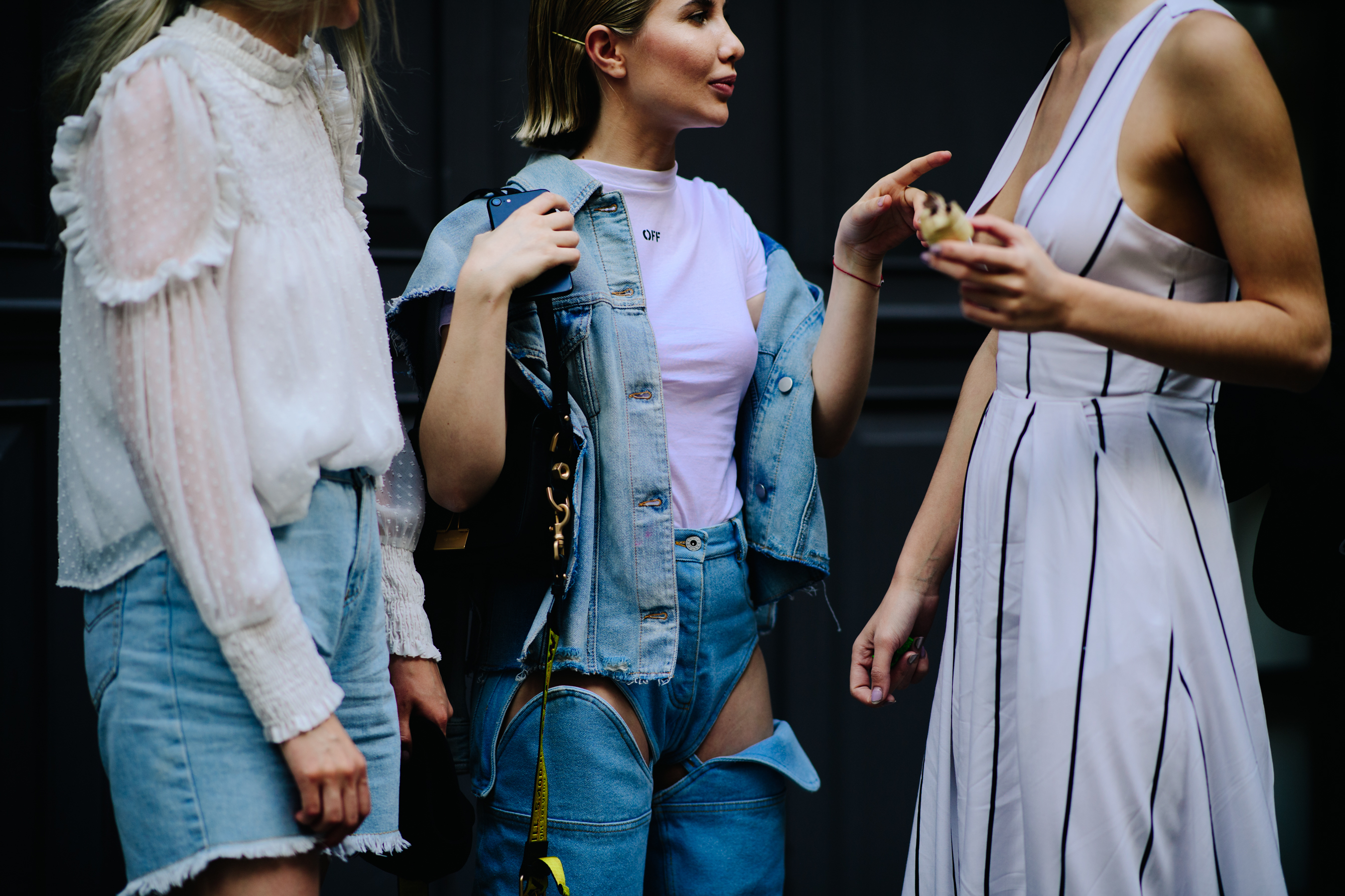 Woman wearing deconstructed blue jeans
