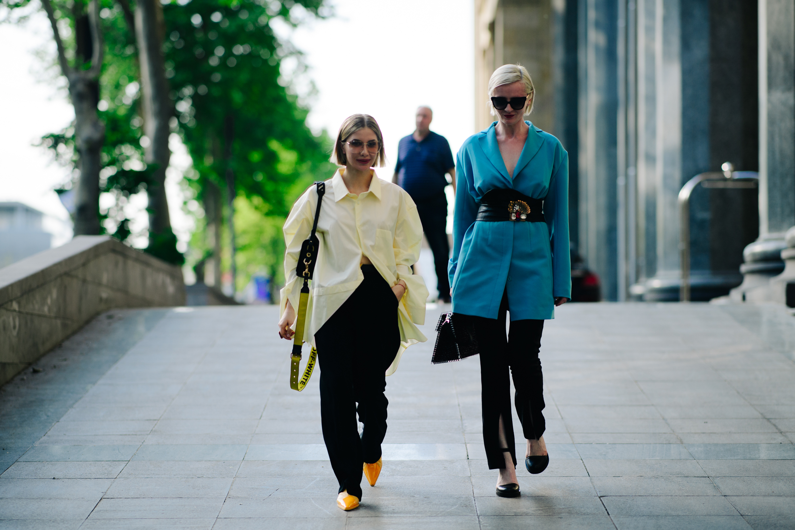 Two girls walking on the street