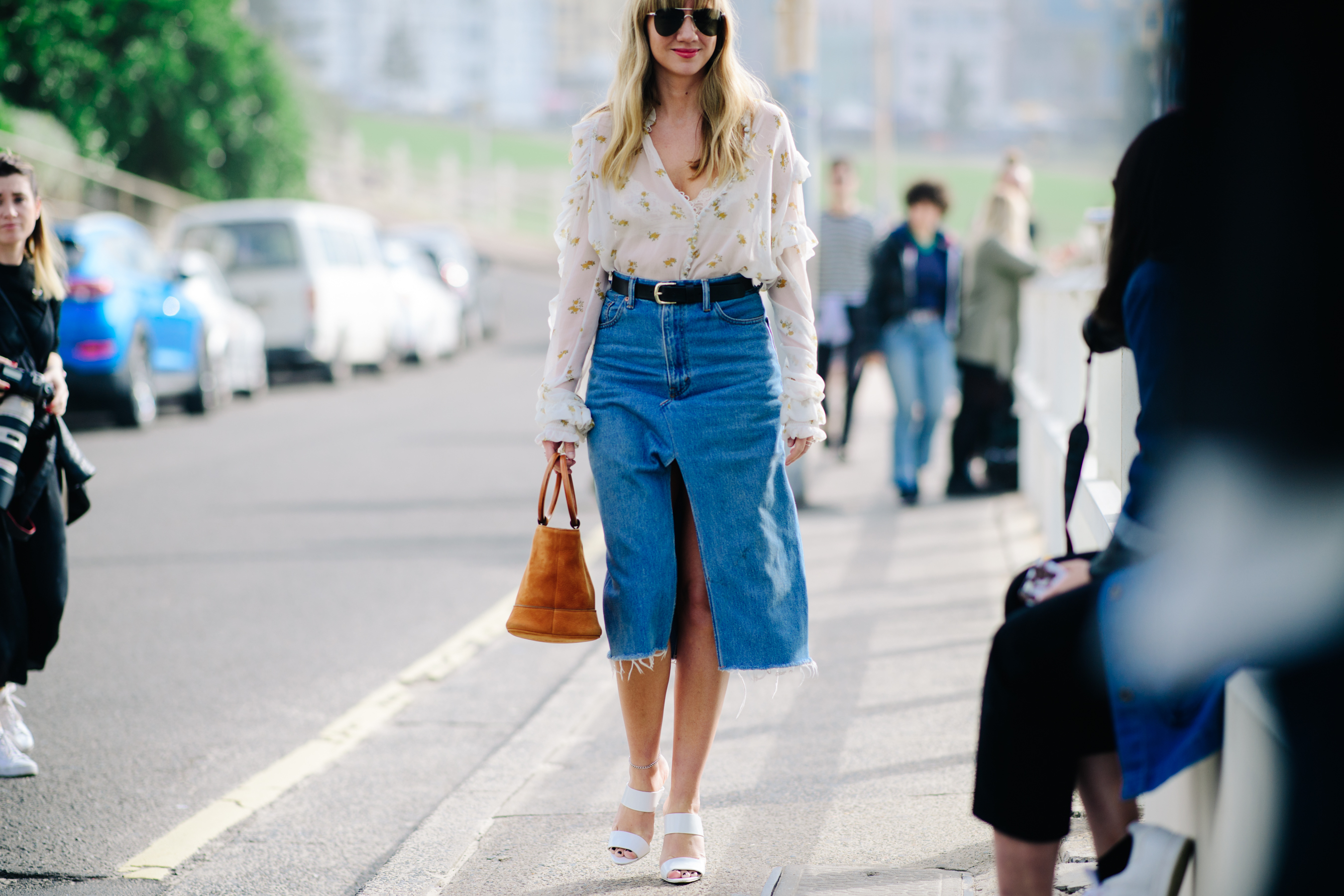 Woman wearing a distressed denim skirt