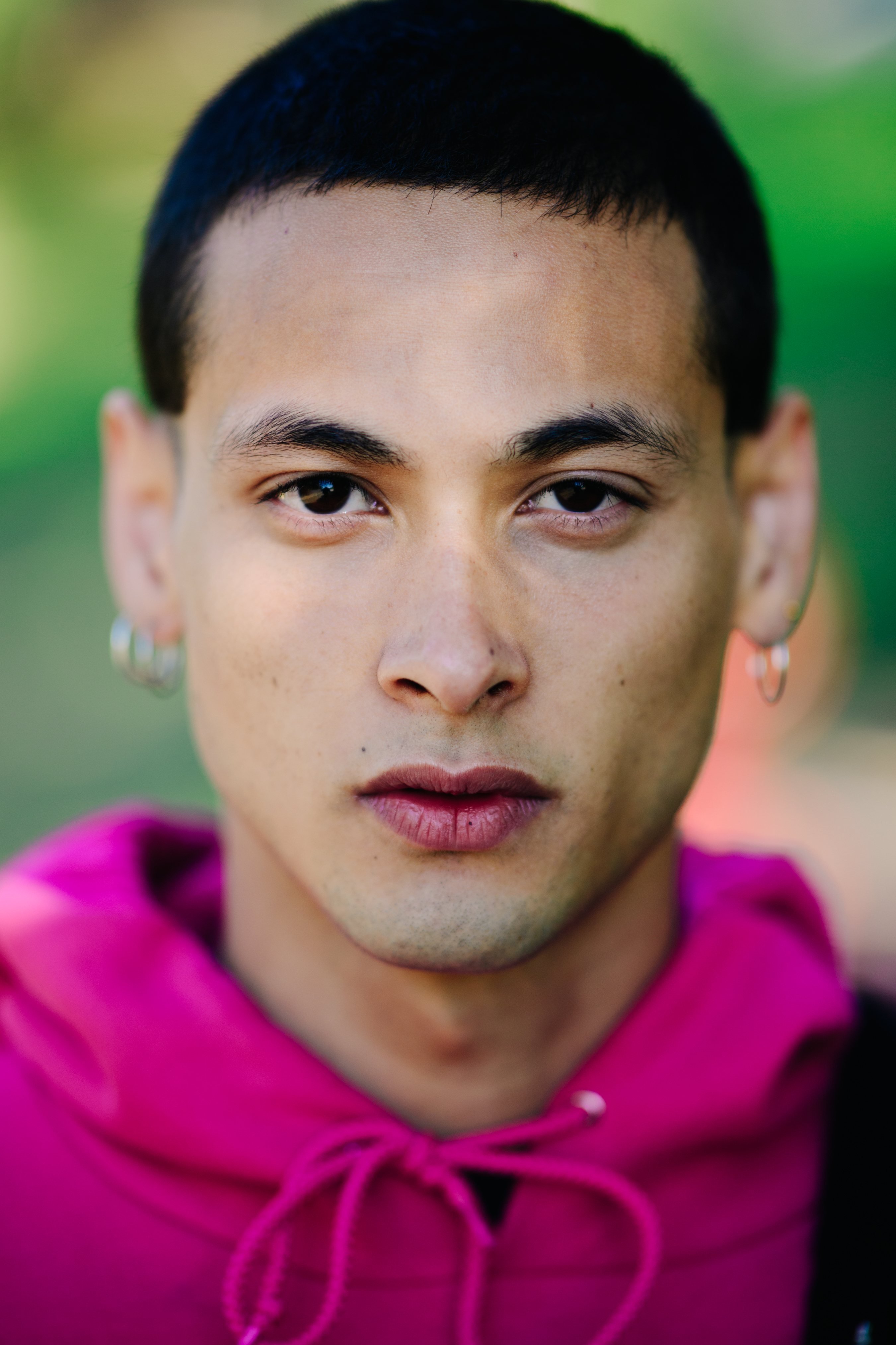 Portrait of a boy with earrings