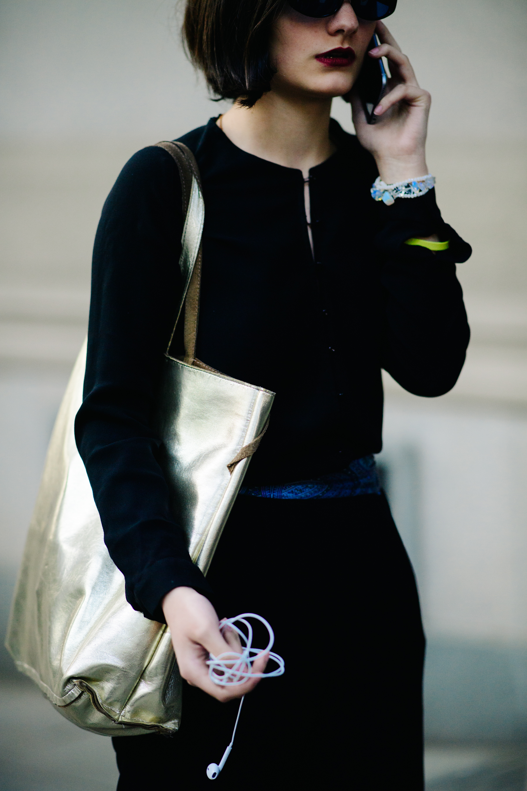 Woman with golden tote bag