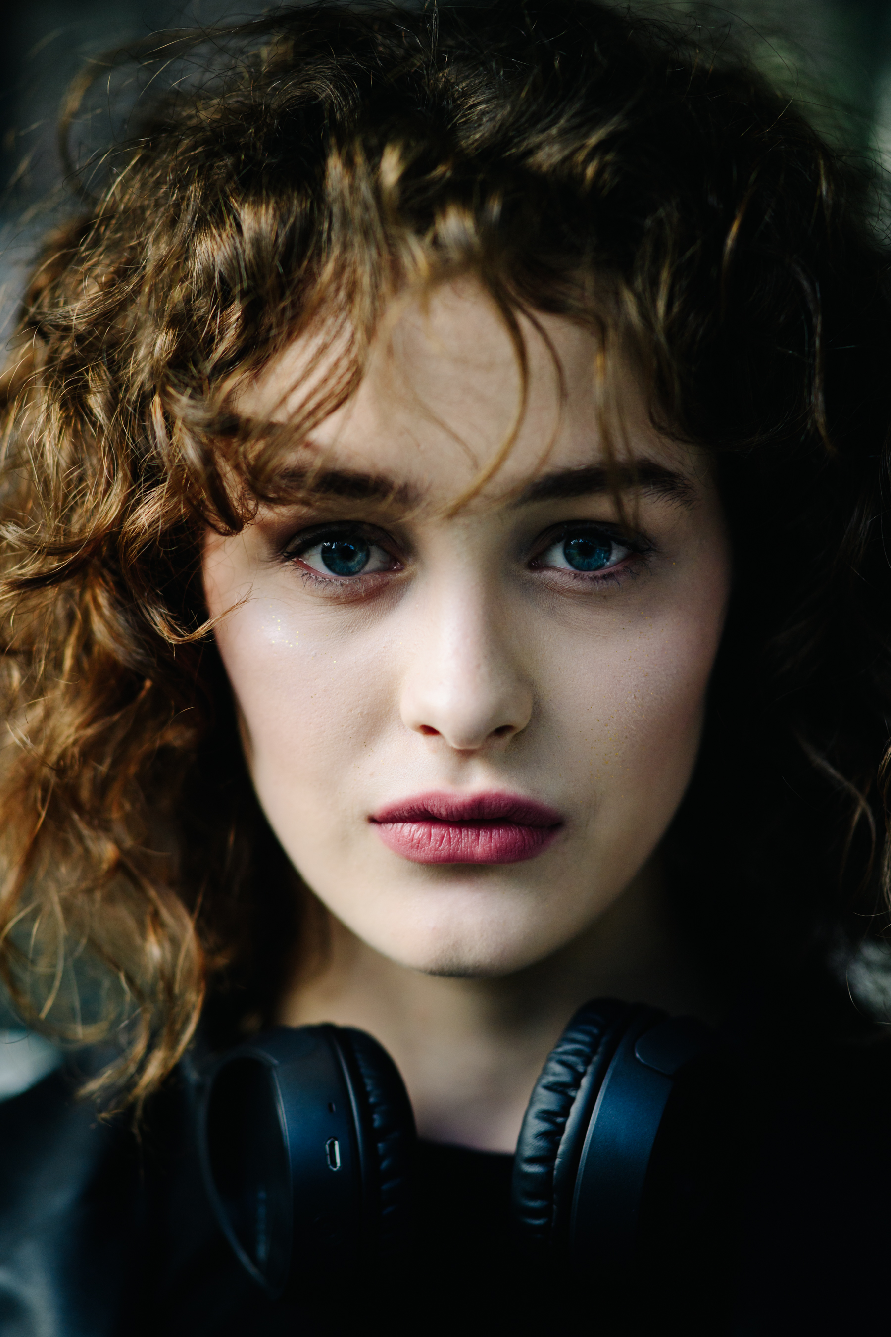 Portrait of a girl with curly hair