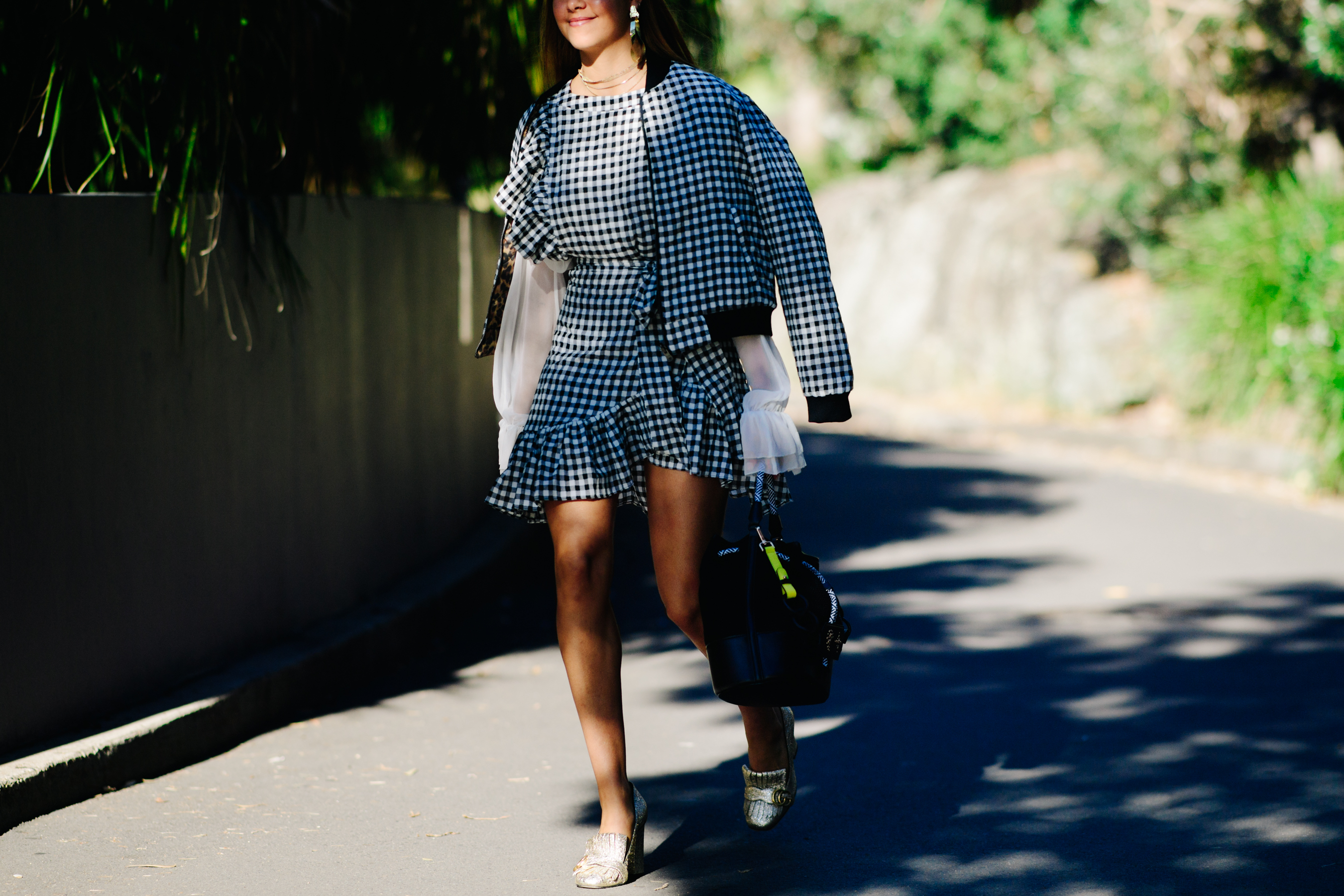 Woman wearing a checkered outfit
