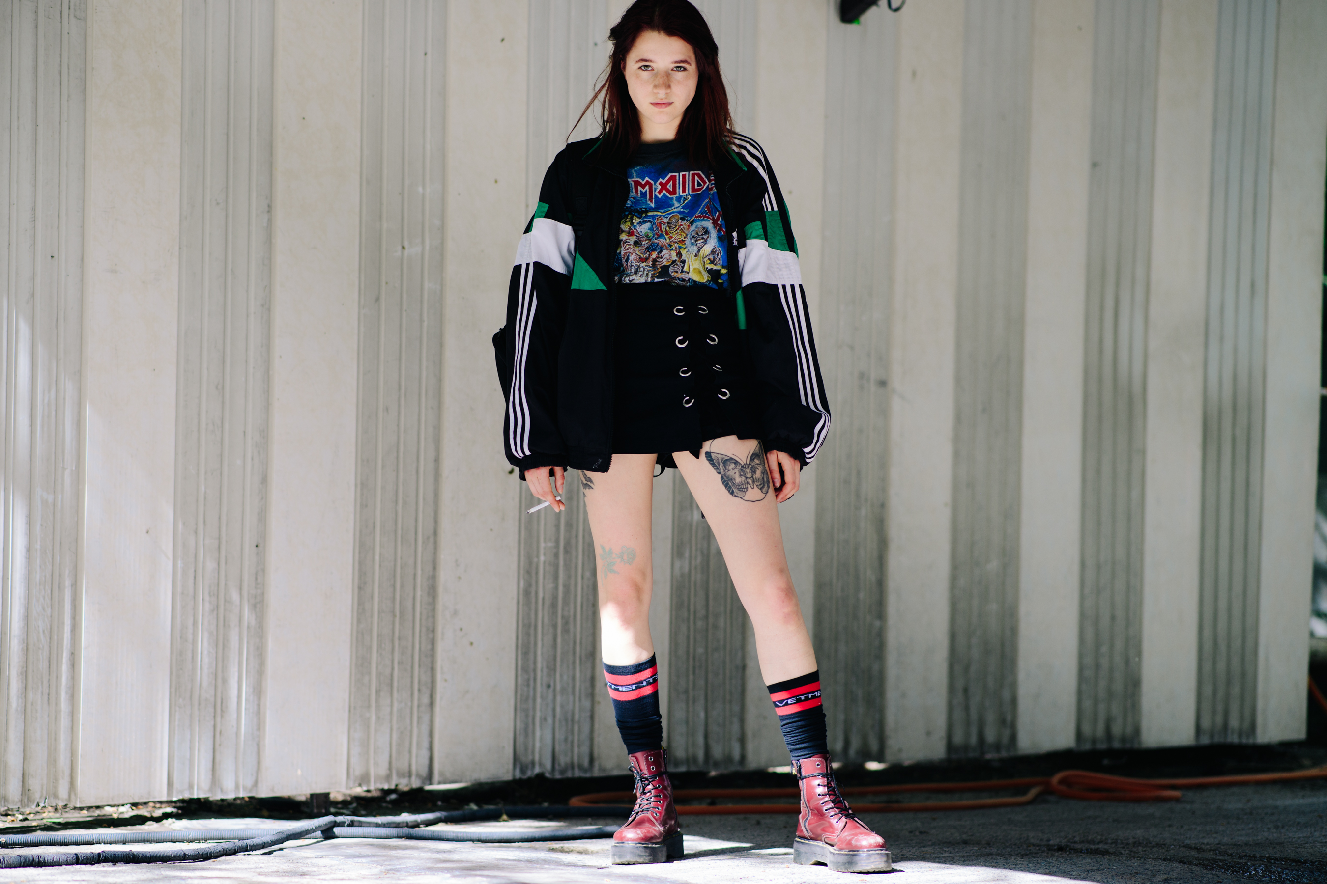 Girl wearing red combat boots