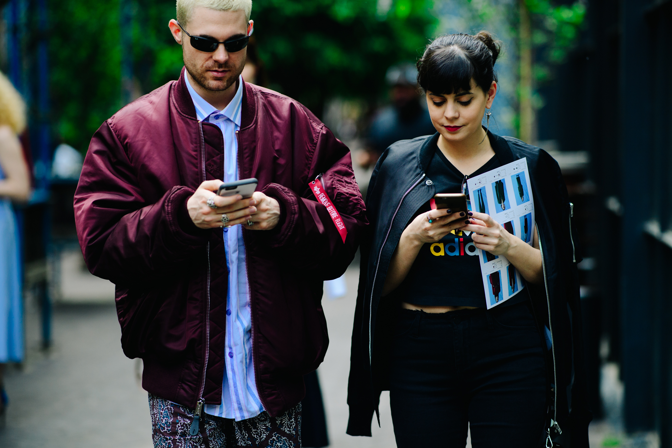 Boy and girl wearing bomber jackets