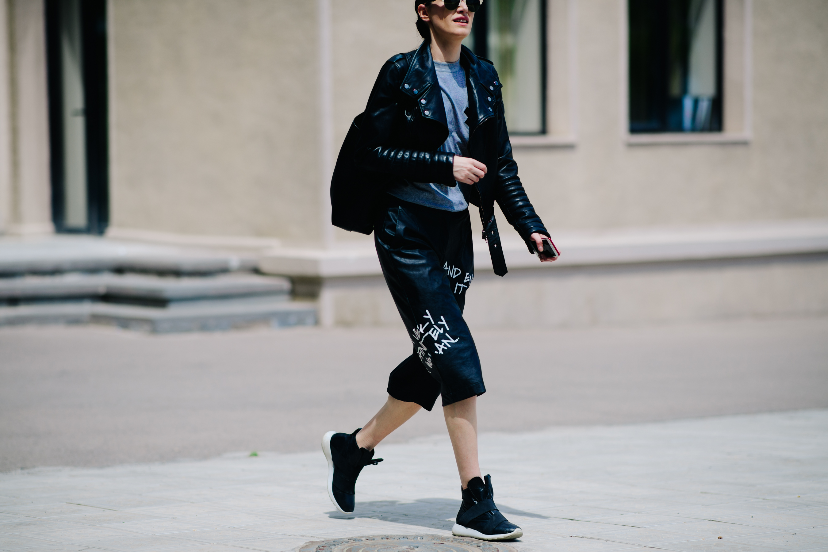 Girl wearing leather cropped pants
