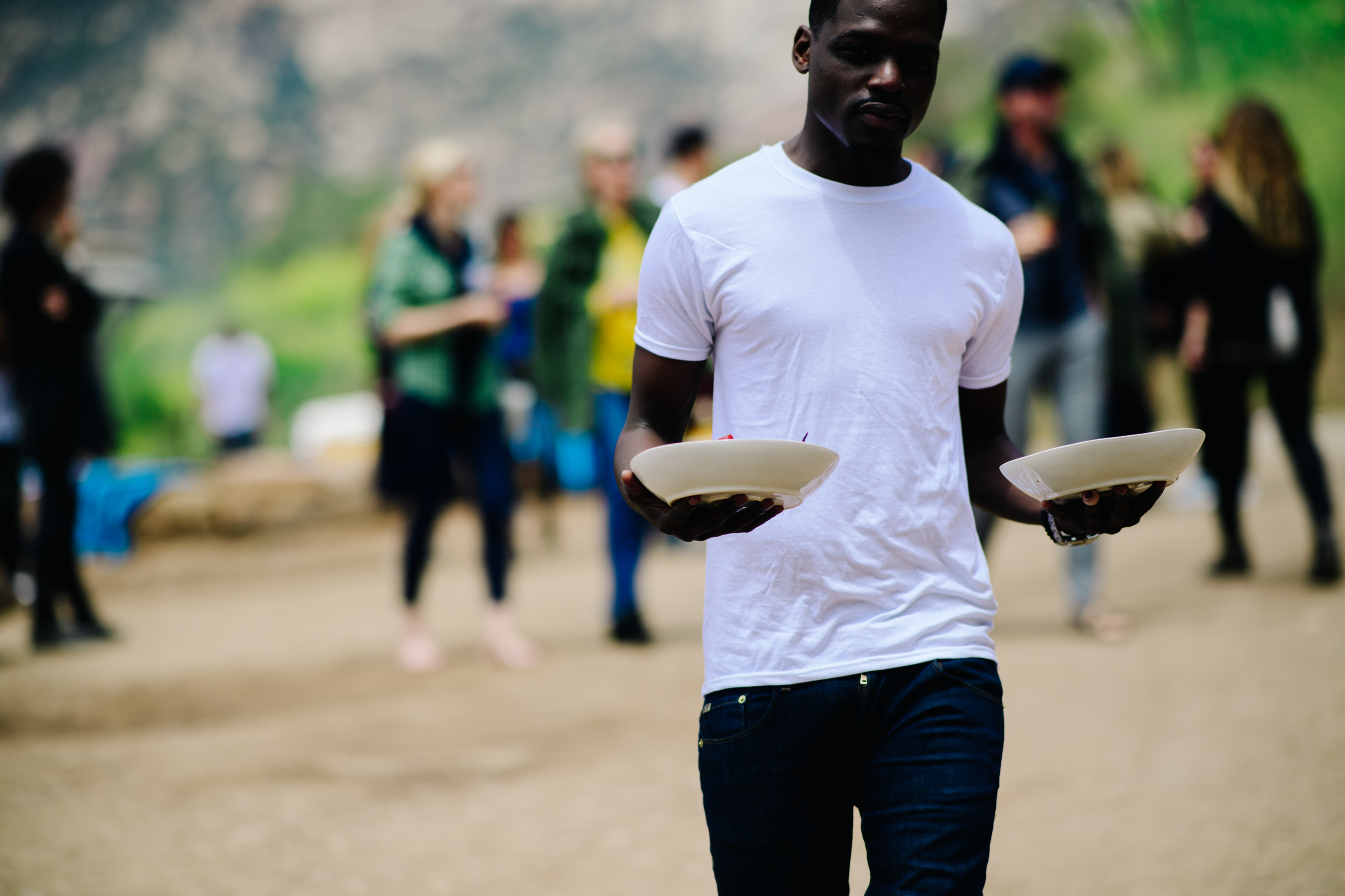 Man wearing white shirt and jeans