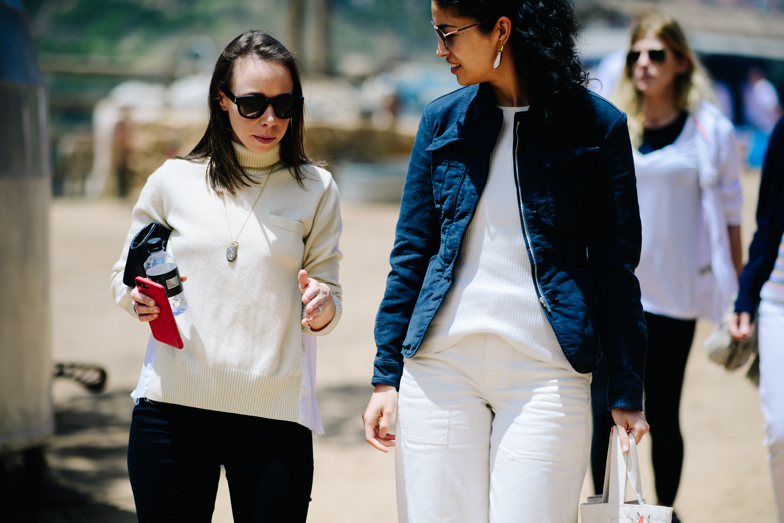 Caroline Issa wearing white sweater