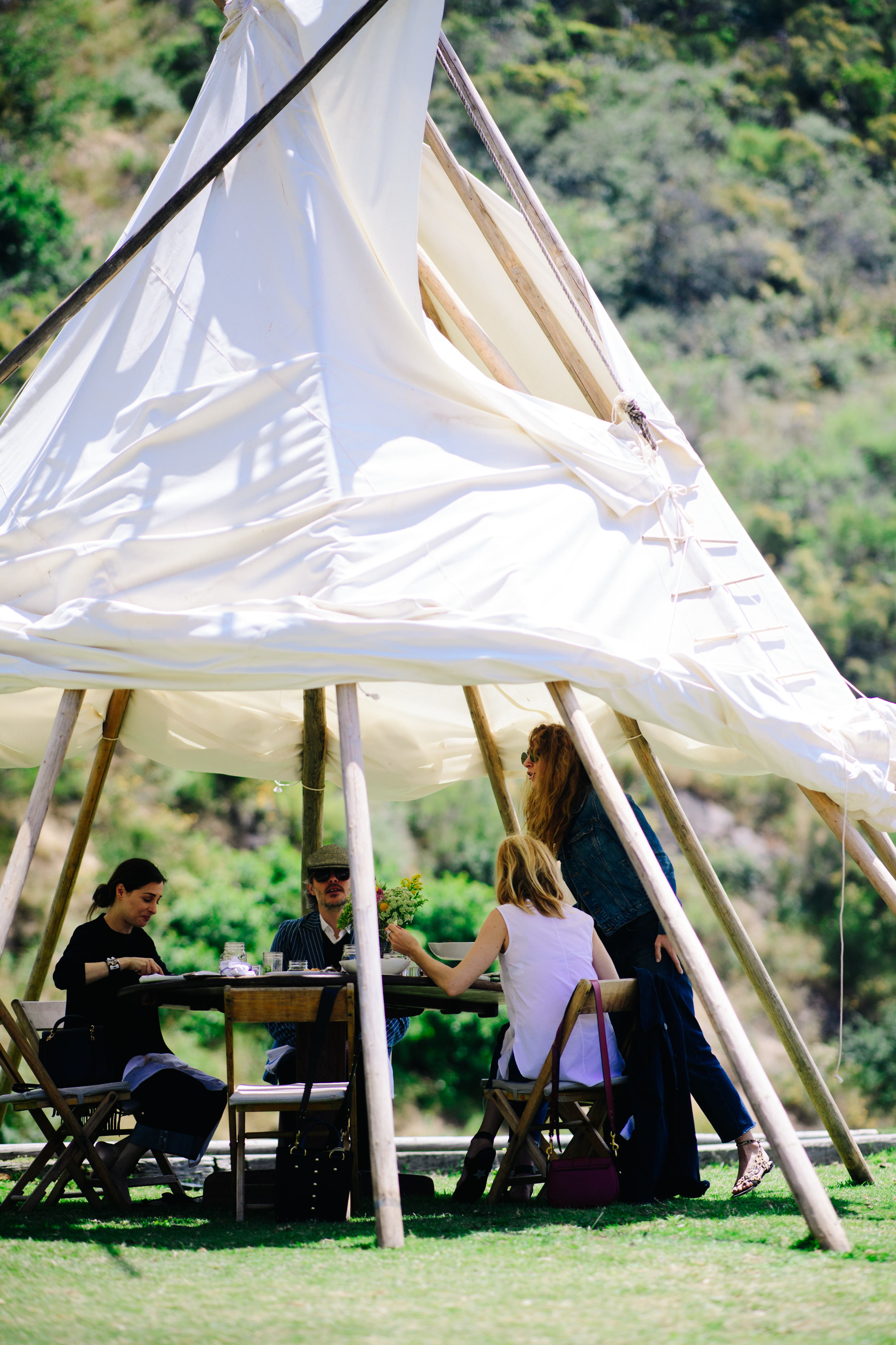Group of people under a tent