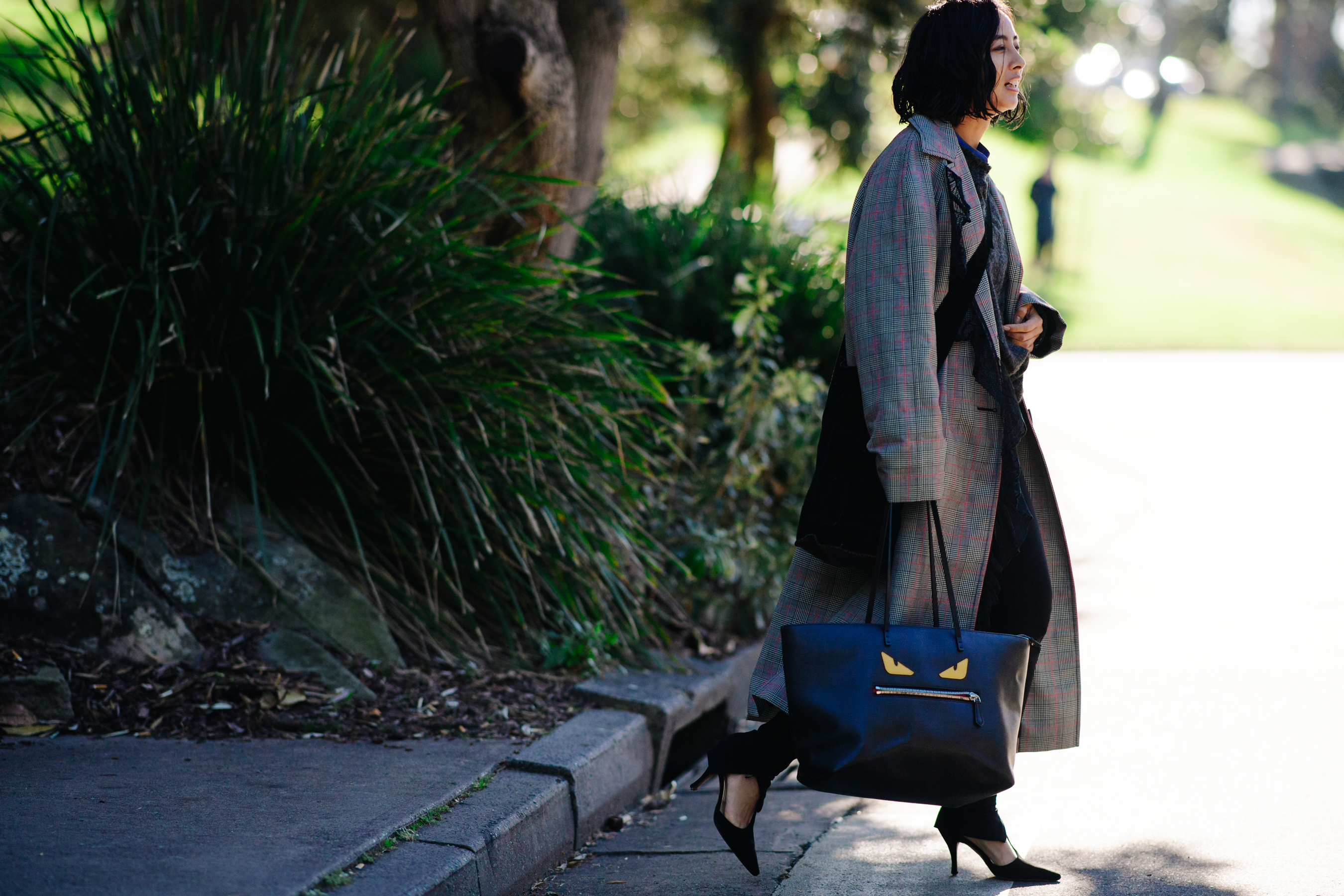 Woman carrying a Fendi bag