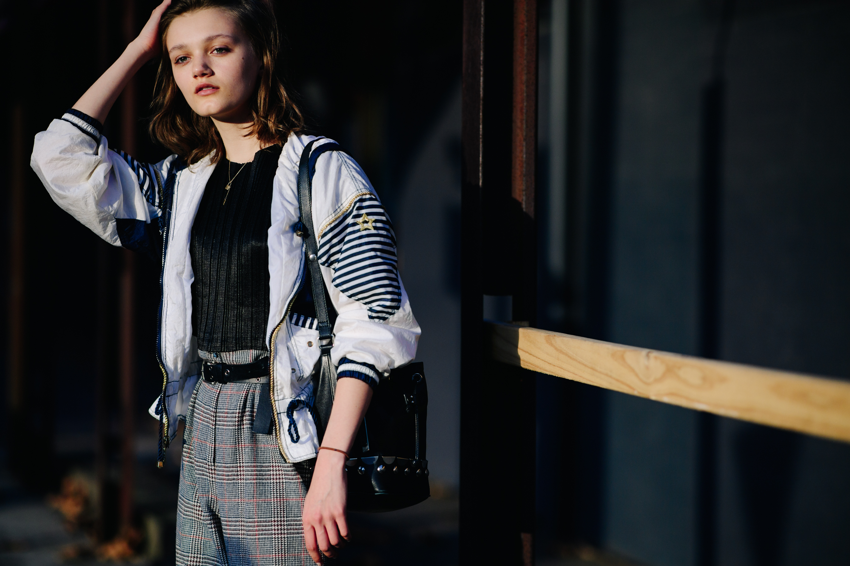Model wearing a vintage bomber jacket