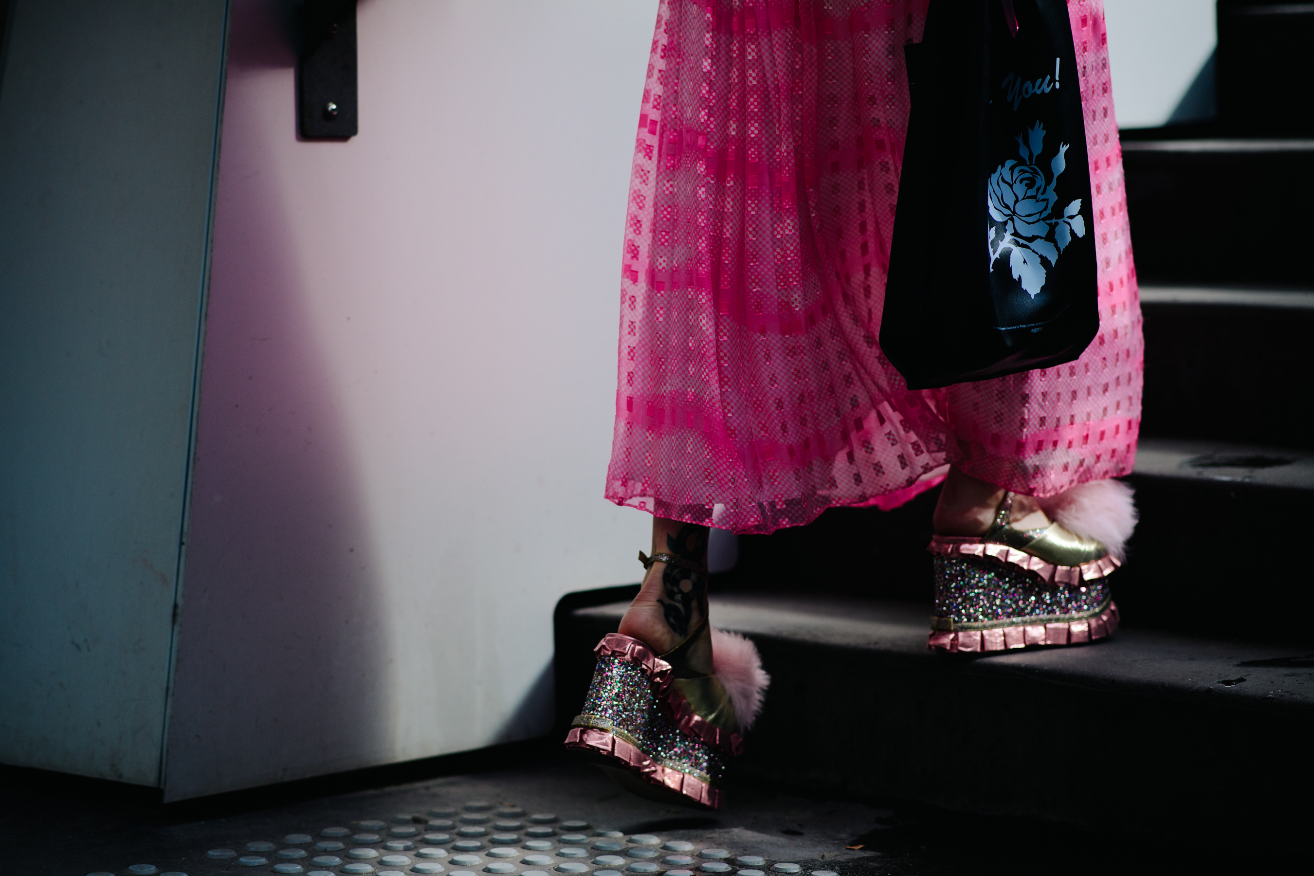 Girl wearing glimmering platform shoes