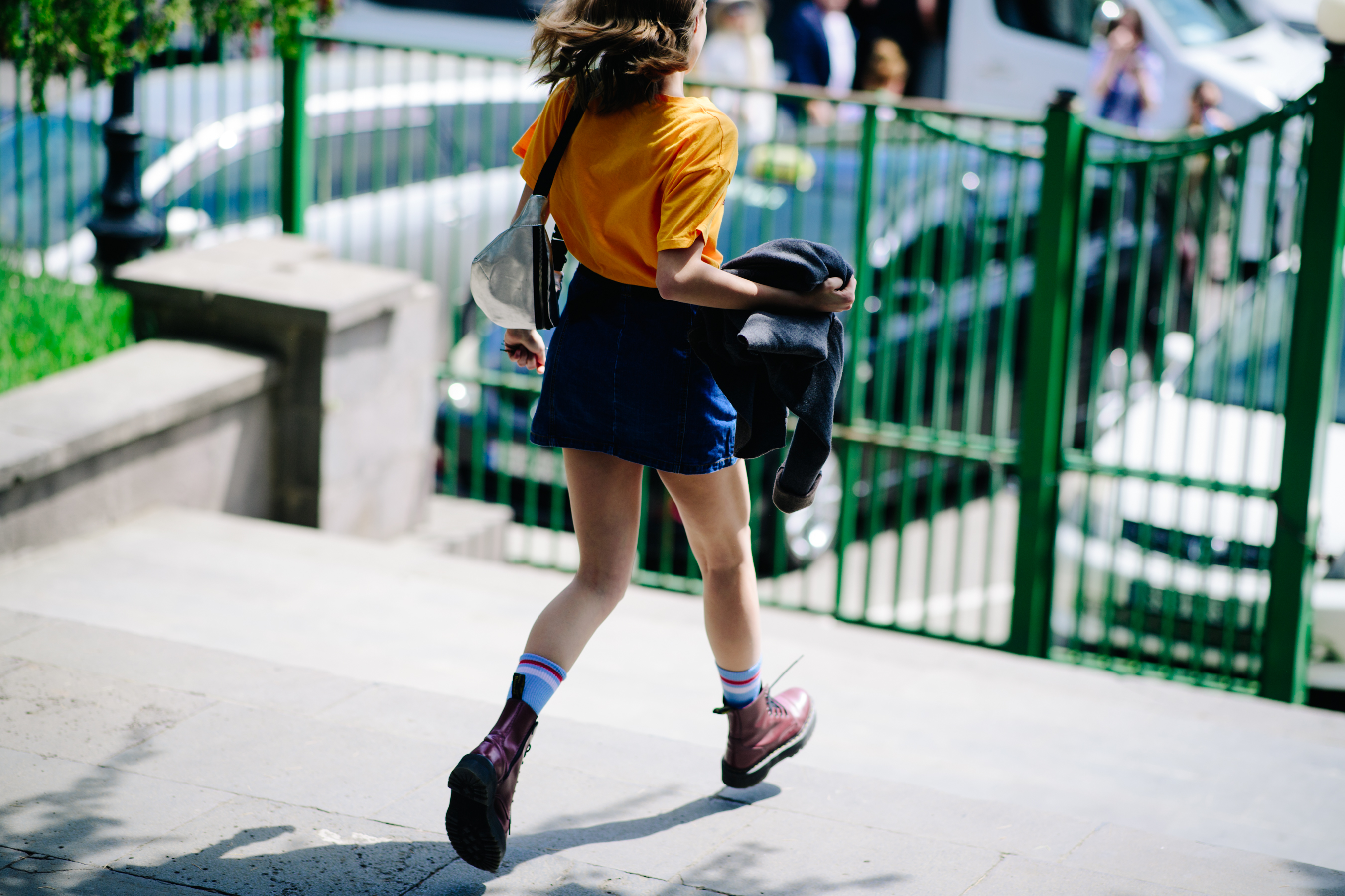 Girl wearing red combat boots